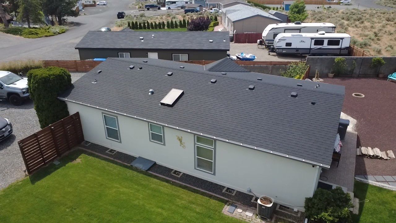 Residential Roof Replacement with Architectural Shingles and Skylight in Date Place Mattawa, WA 99349 The Denali System - 5-Star SureStart PLUS Coverage - CertainTeed 50 Year Material Guarantee - CertainTeed Workmanship Guarantee: 30 Years - CertainTeed Warranty Transfer Period: 20 Years - Certainteed Landmark® Shingle - Cinder Black by Alpine Roofing
