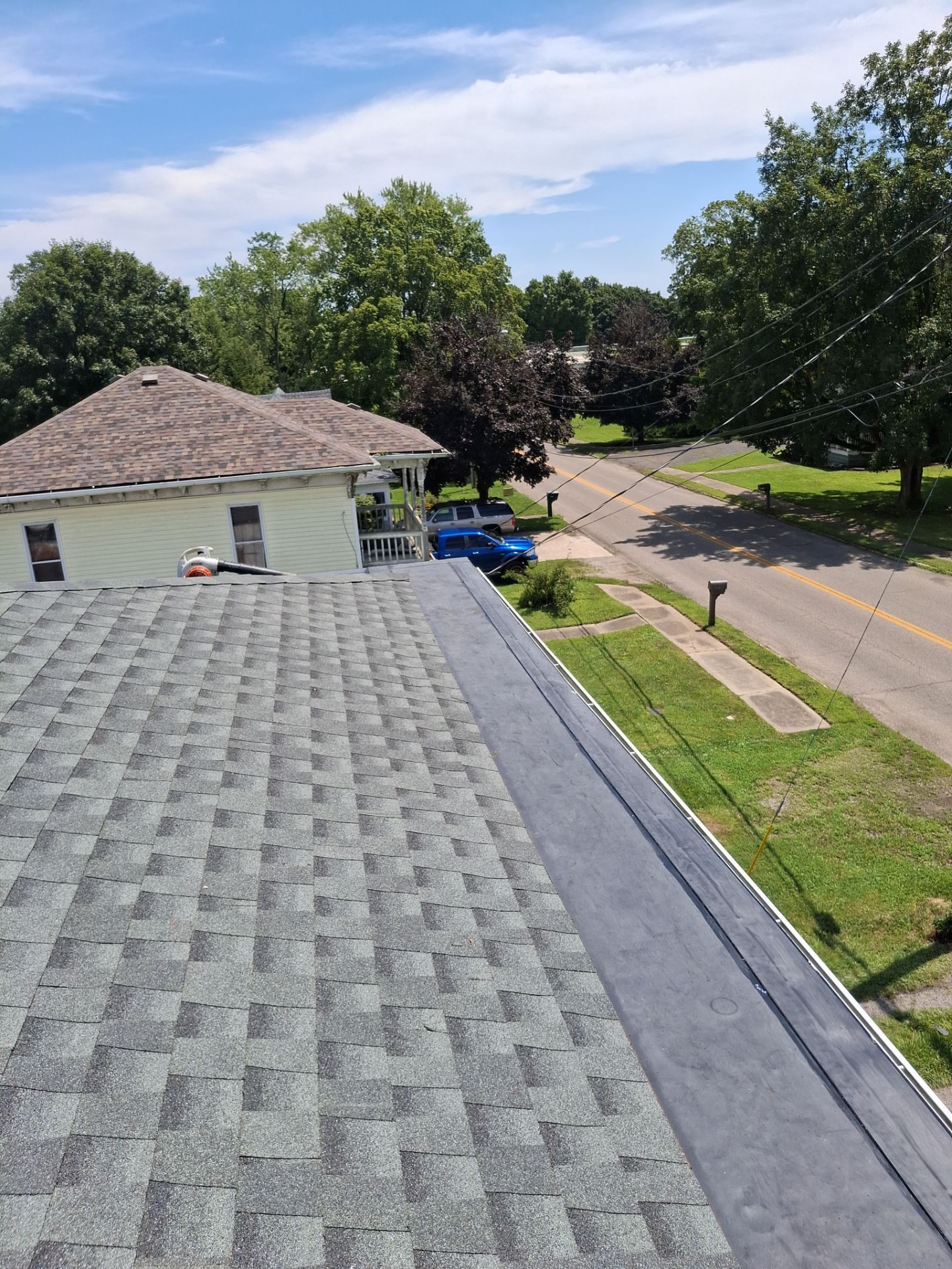 Residential Roofing Installation using GAF Timberline HDZ Williamsburg Slate by Rainstoppers Roofing
