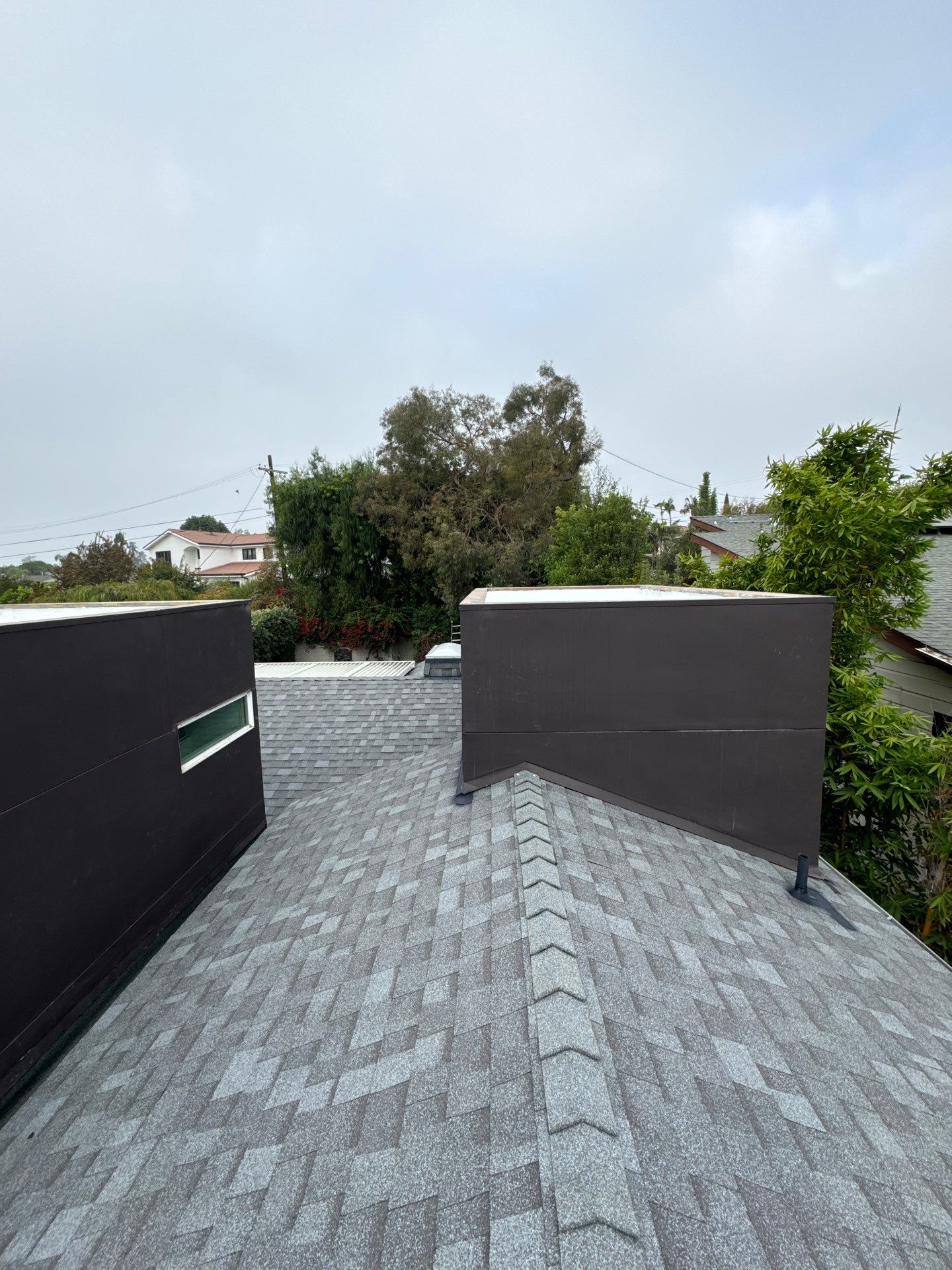 Residential Roofing Installation using Shingles and Silicone by Hull Brothers Roofing