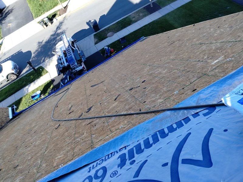 Residential Roofing Installation using Atlas Pinnacle Pristine Black Architectural Shingles by Frederick Roof Repair