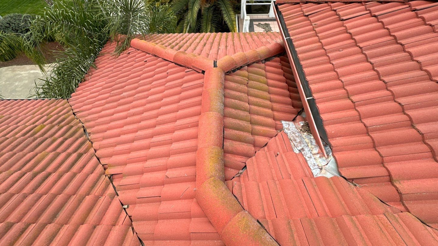 Tile refurbish project using existing tiles and replaced underlayment and battens by Straight Edge Roofing Inc