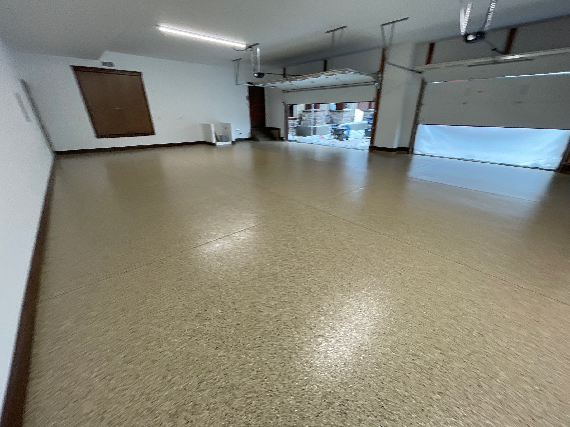 Garage Transformation using Pecan by Croc Coatings, LLC