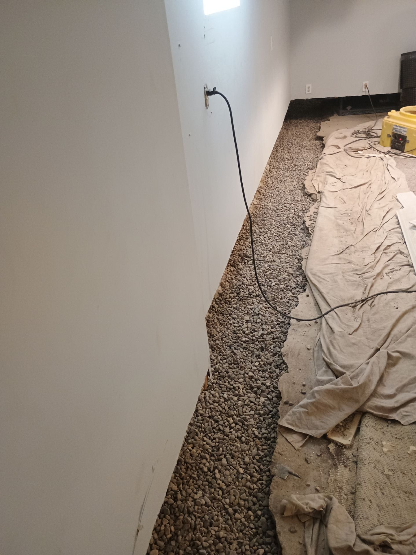 Interior Drain Tile Installation in South Minneapolis by Waterproofing Northeast