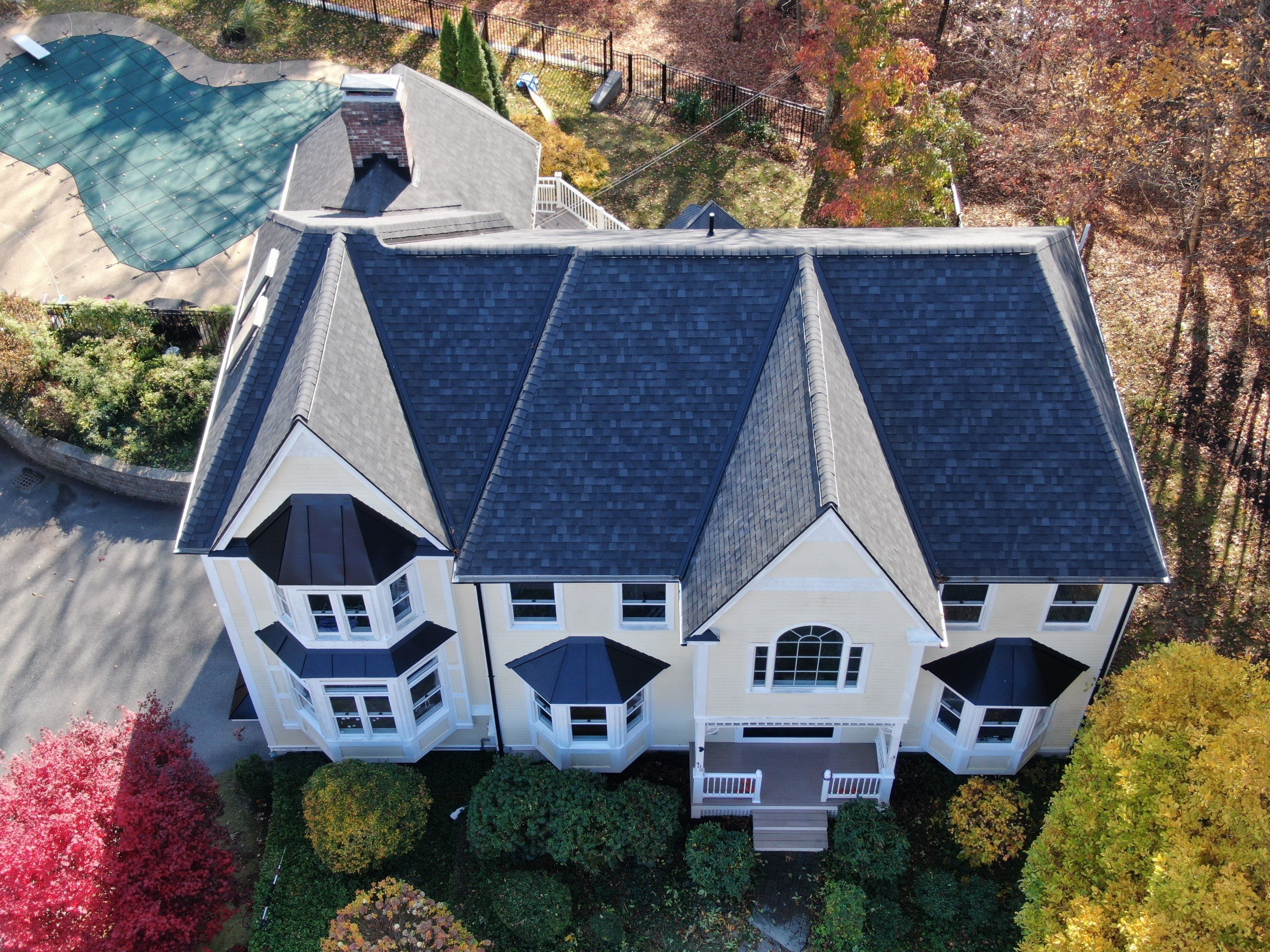 New Roof, Skylights, and Metal Accent Roof Installation in Groton by Mighty Dog Roofing of Greater Middlesex County