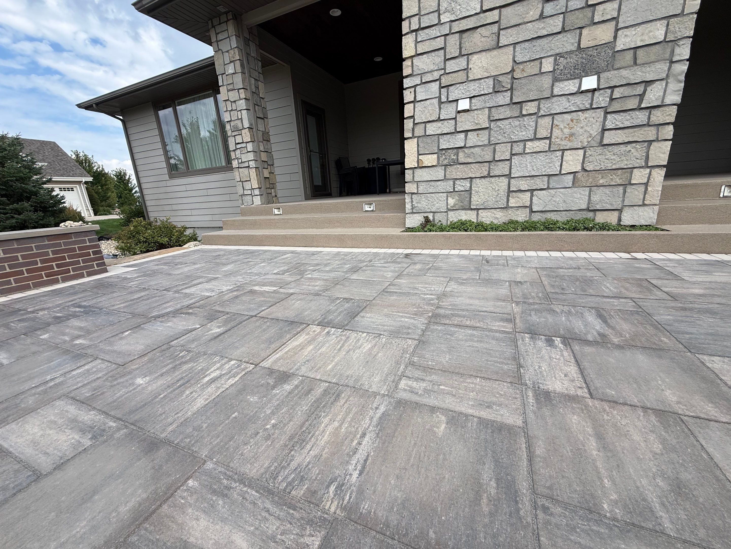 Sioux Falls Patio Concrete Coating and Porch Step Repair by Select Painting, Coatings & Garage Cabinets