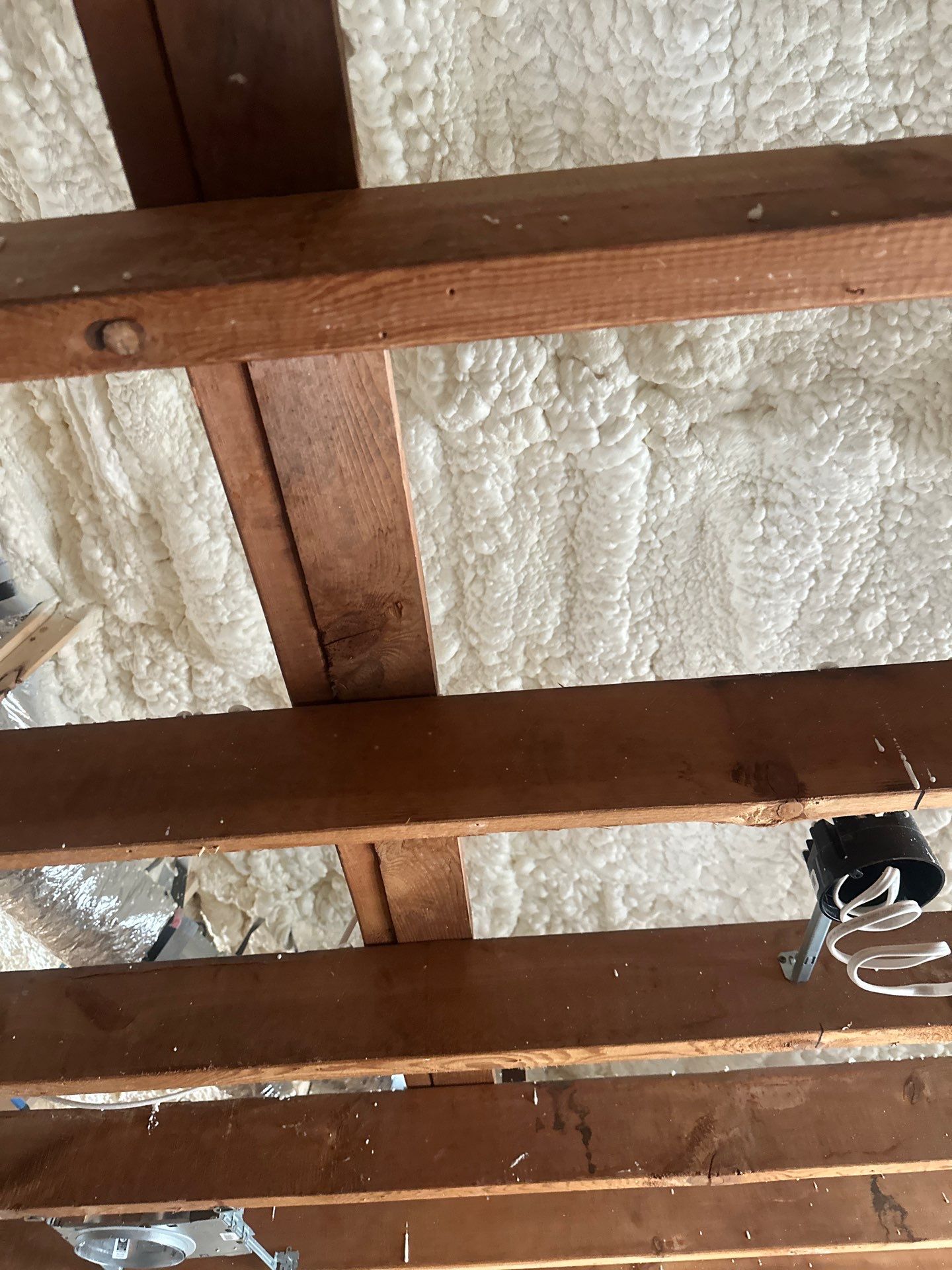 Open cell spray foam & rockwool job completed in Dallas TX by Apex Insulation Solutions