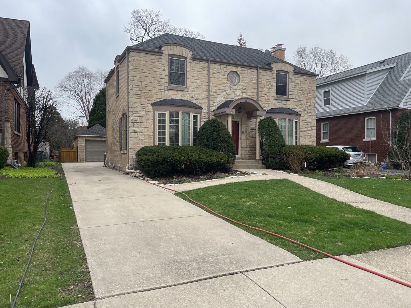 Wood cleaning and staining using Armstrong cloark oil stain by Northern Power Washing LLC.