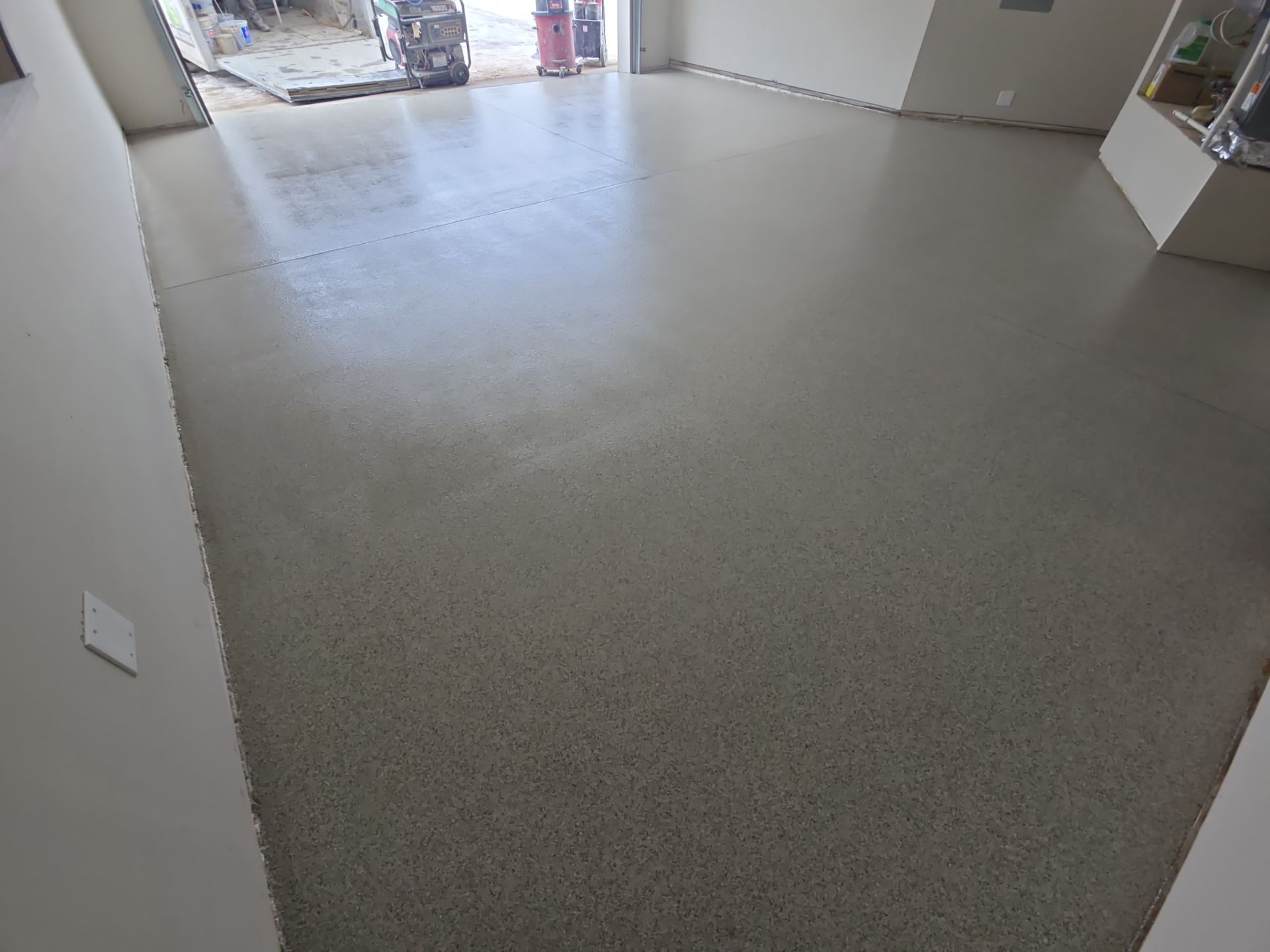 Garage Transformation using Stone/Marble Hybrid by Croc Coatings, LLC