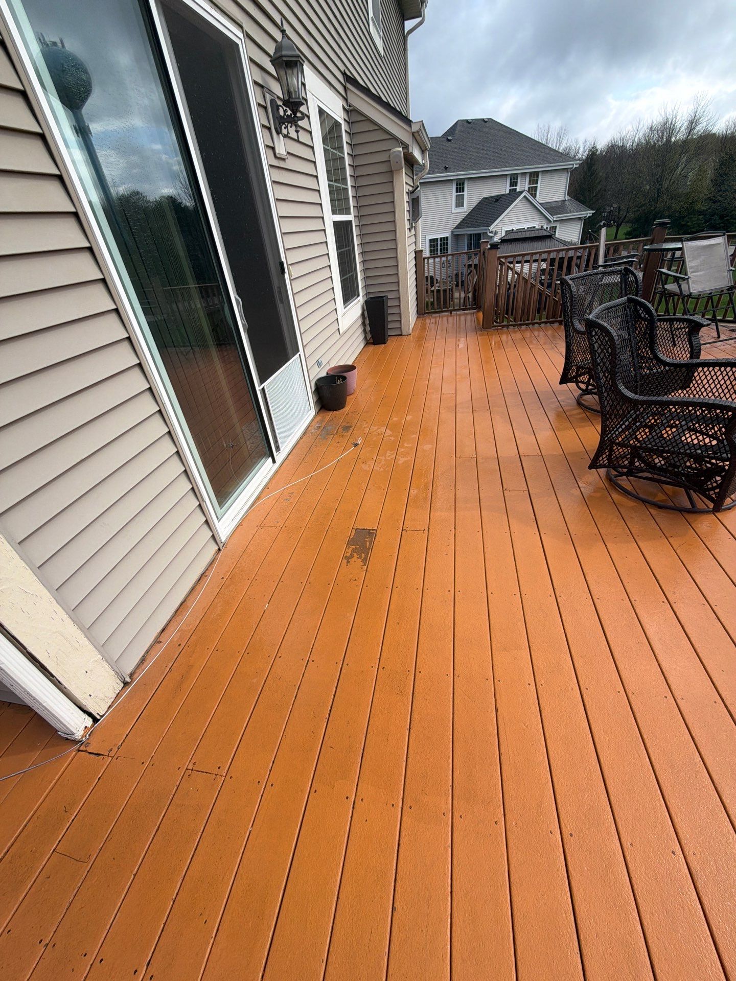 Elevated Wood Deck Refinishing and Railing Restoration in Waukesha by OCS Contracting Services