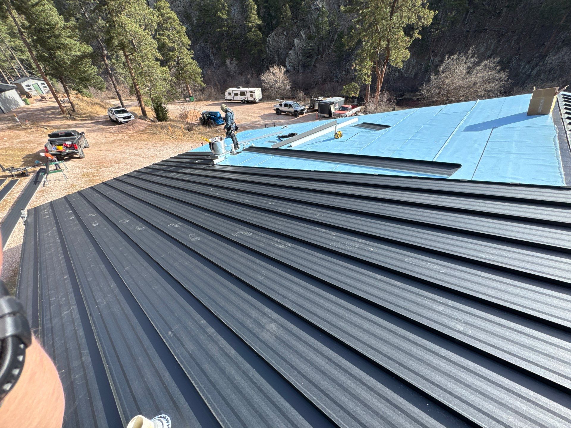 Residential Roofing Installation using Steel Roofing by Weather-Tite Exteriors LLC