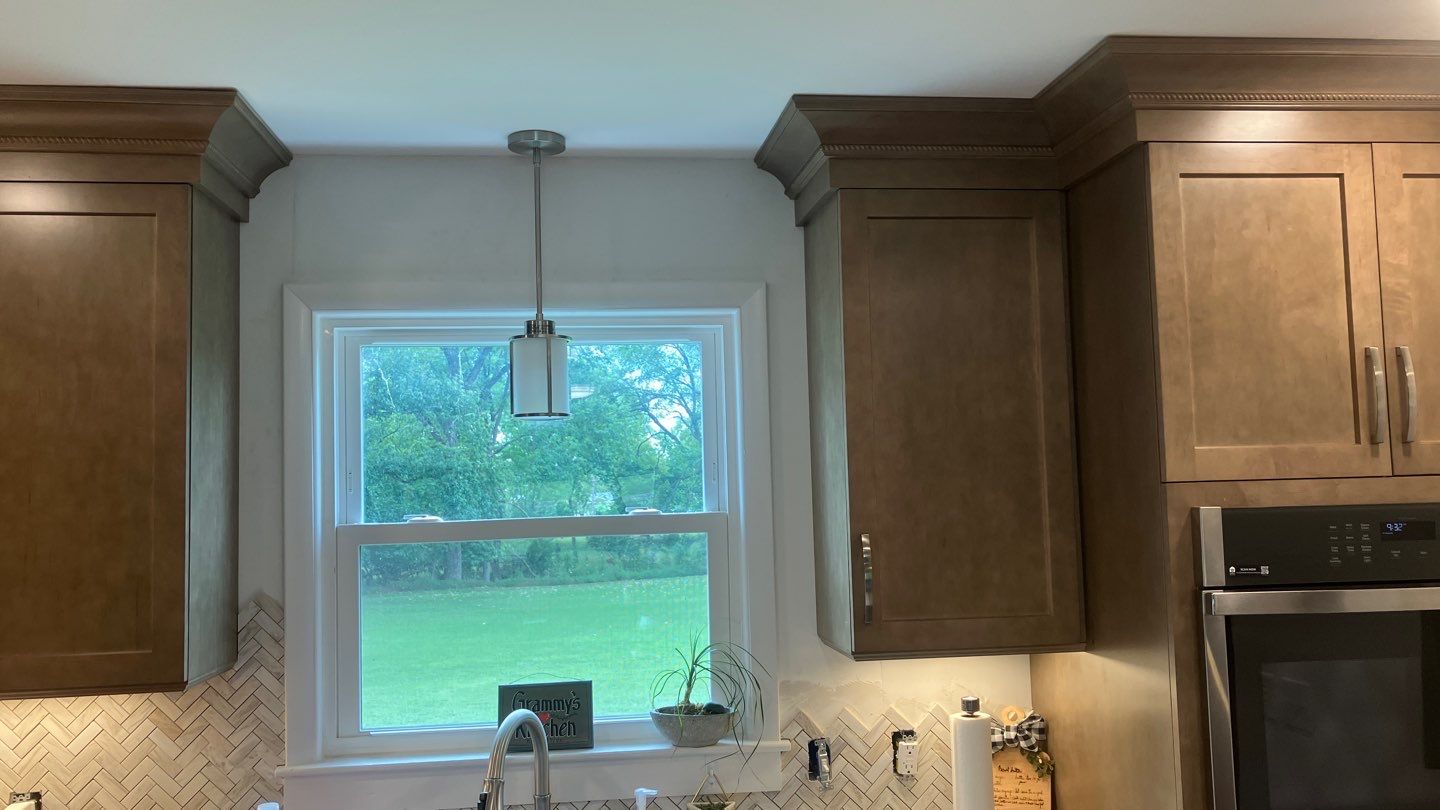 Beautiful Herringbone Backsplash  by Footprints Floors of Nashville