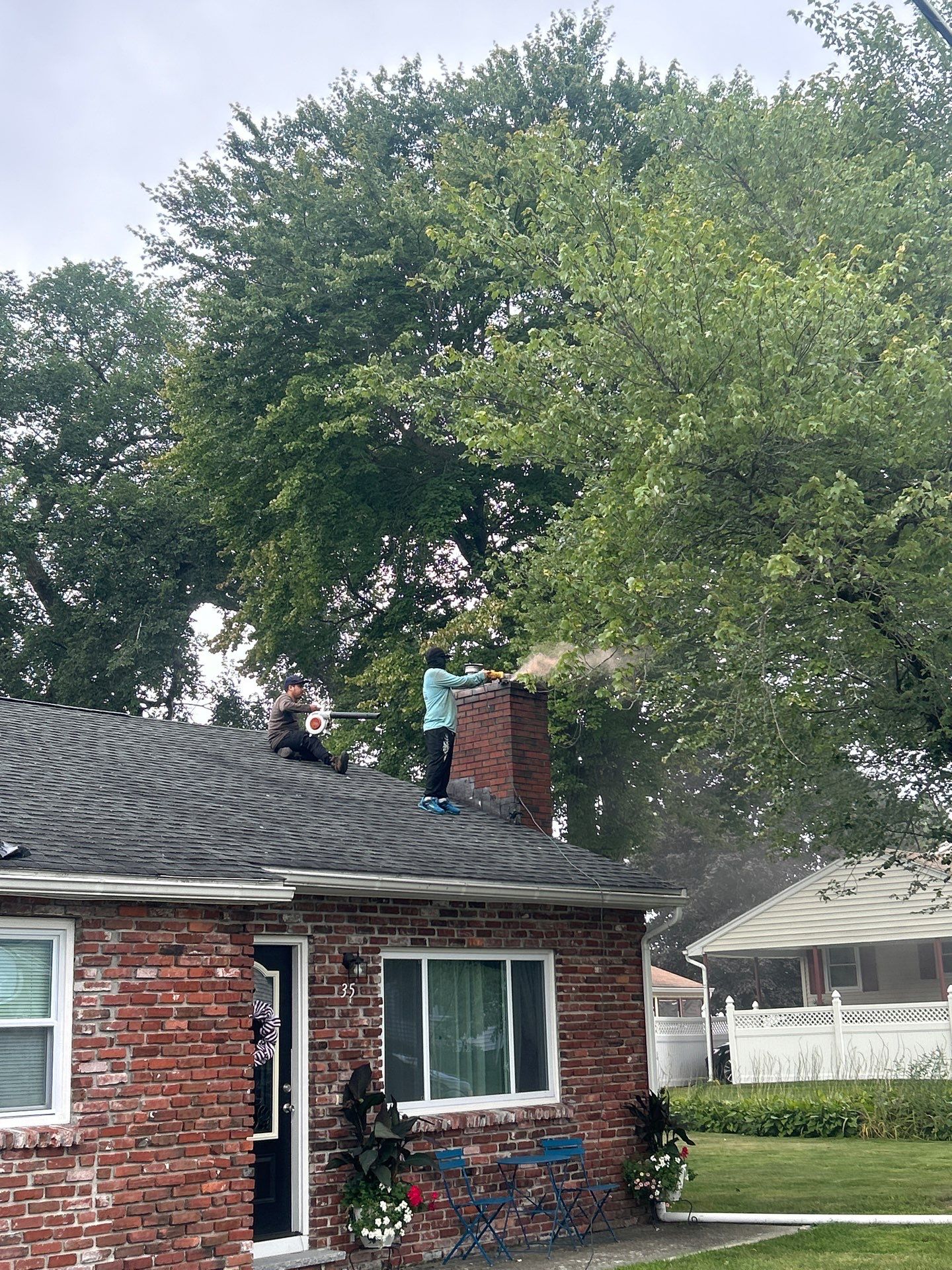 Lowell Premium Velux Curb-Mount Skylight & Chimney Restoration by Mighty Dog Roofing of Greater Middlesex County