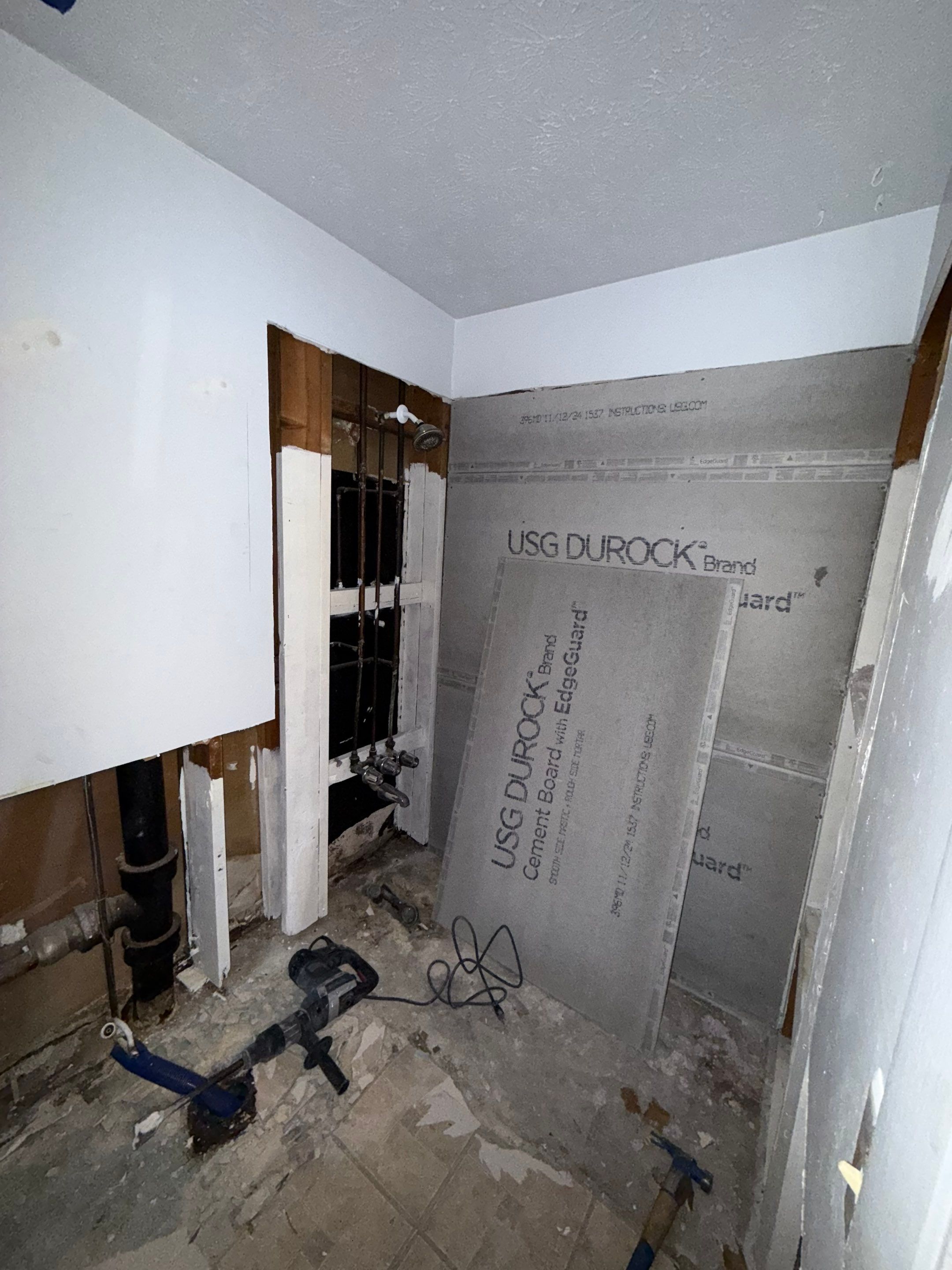 Dual Bathroom Makeover by urban green energy llc