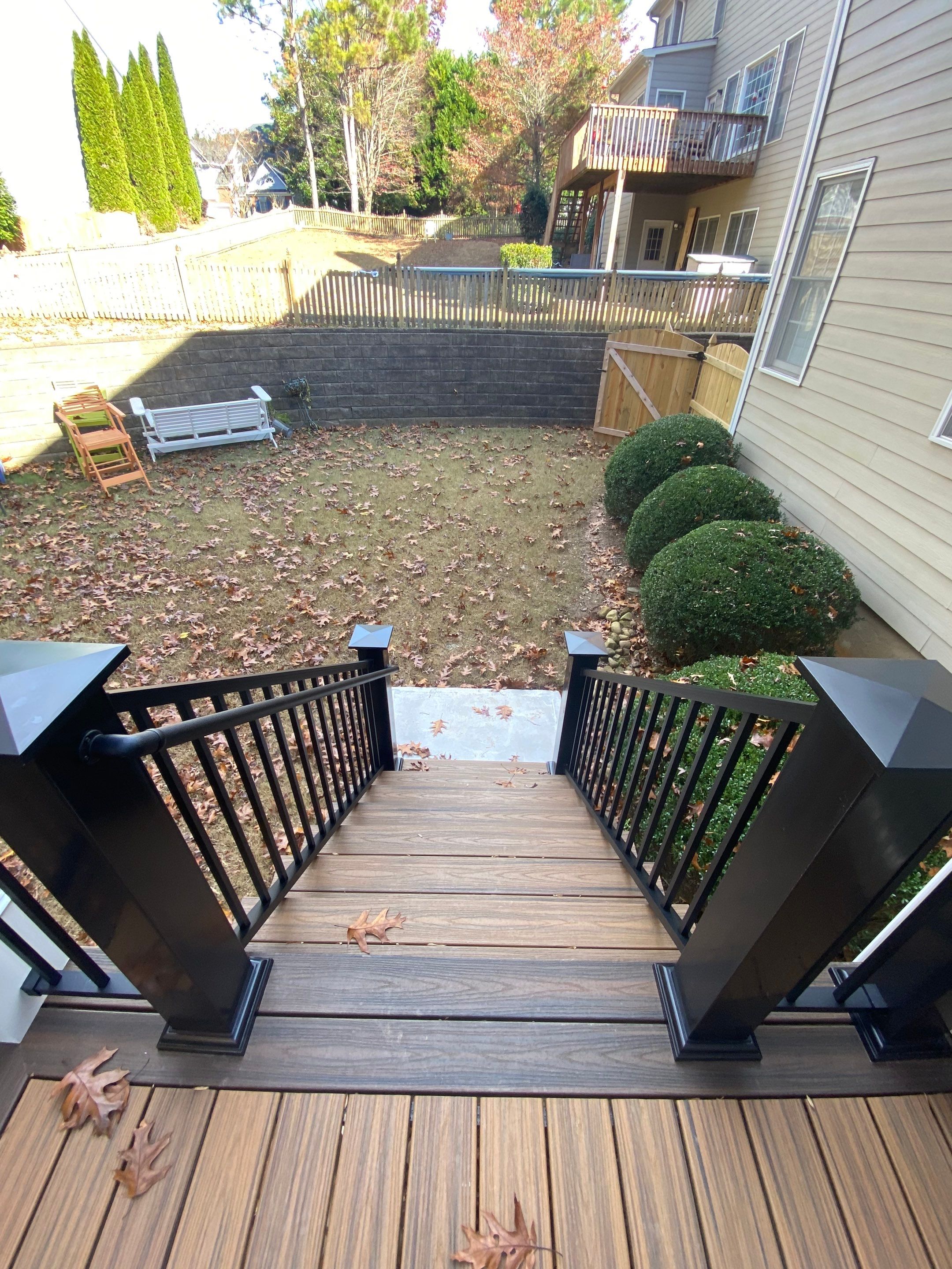 Smyrna Composite Deck and Covered Porch Renovation by Swift Home Renovations