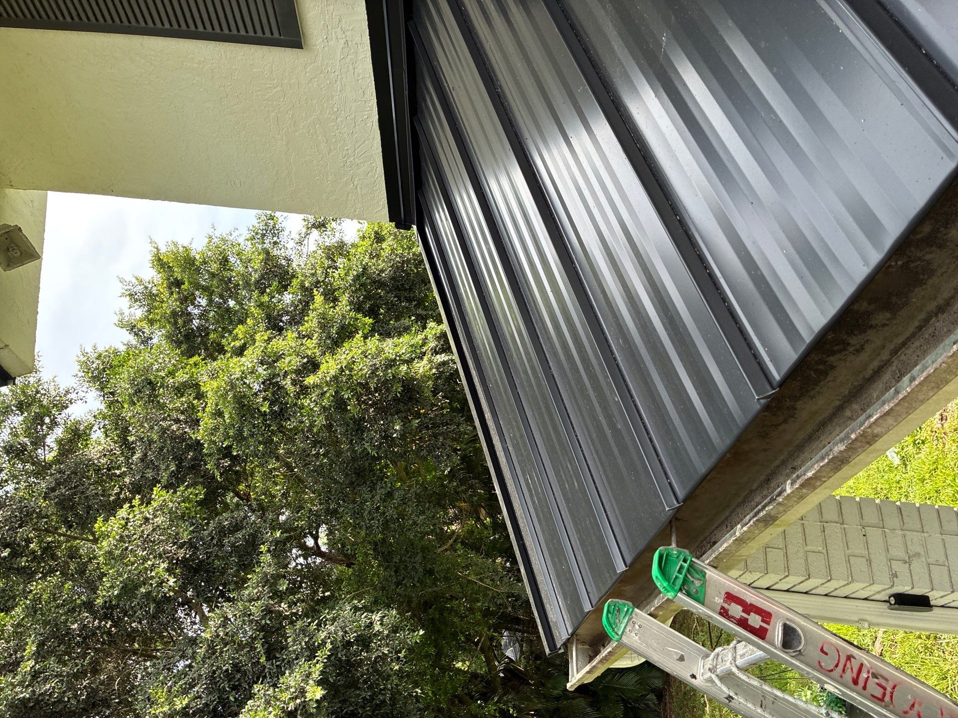 24ga 1" Nail-Strip Matte Black by Total Roofing System The Metal Roof Experts