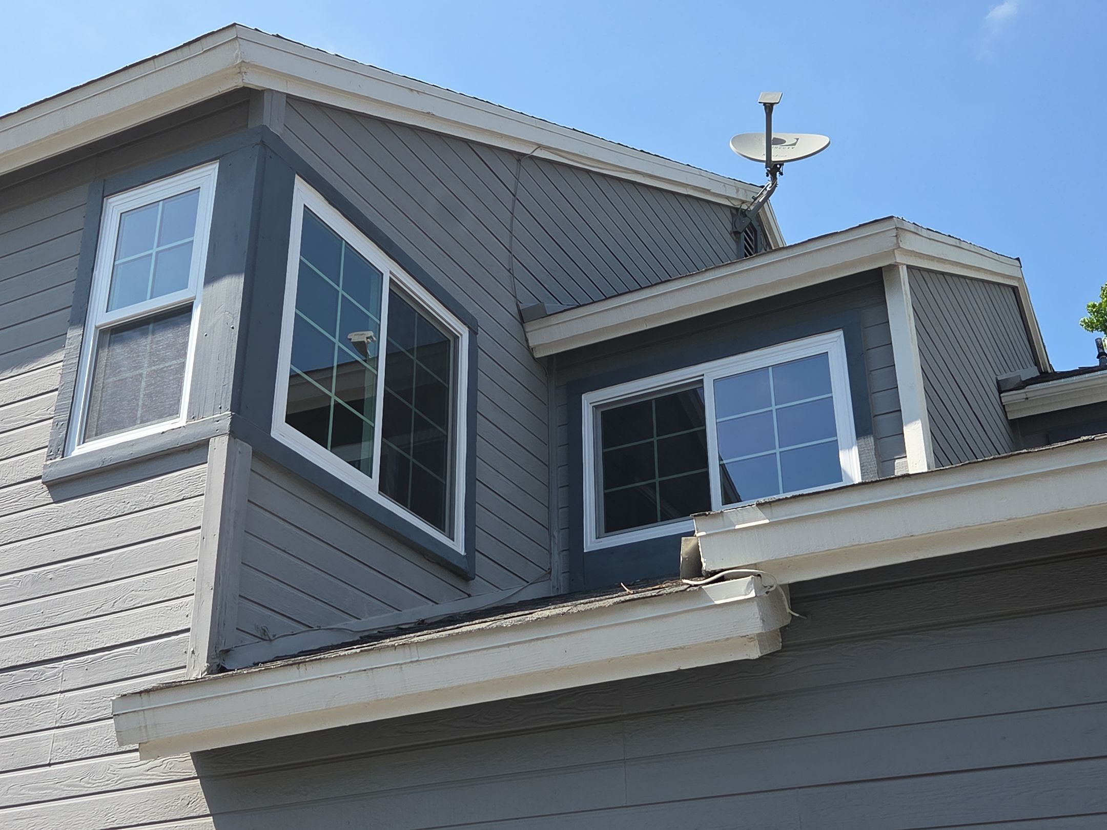 Window Installation using Milgard V300 Trinsic with grids by American Window Company