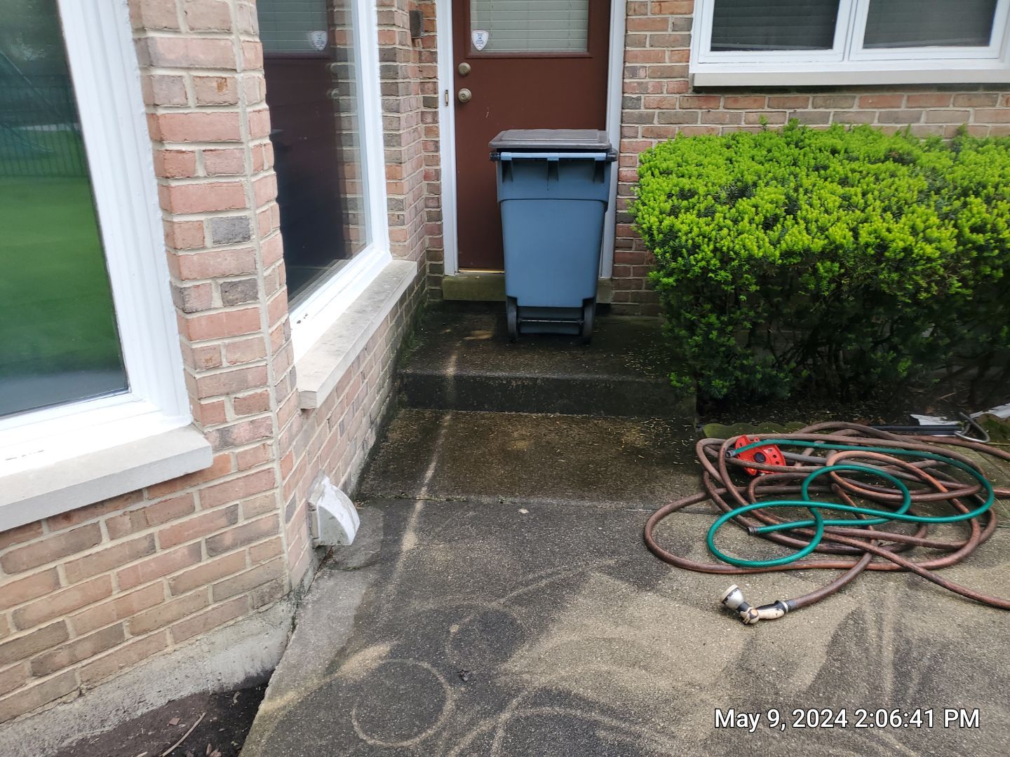 concrete patio, retaining wall, awning cleaning by Northern Power Washing LLC.
