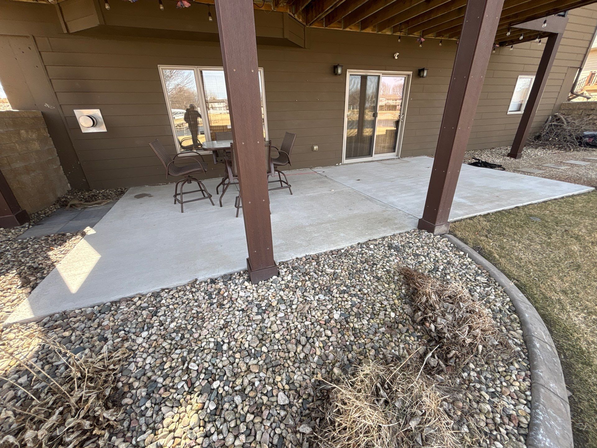 Full Exterior Renovation with Stone Veneer and Composite Decking by Select Painting, Coatings & Garage Cabinets