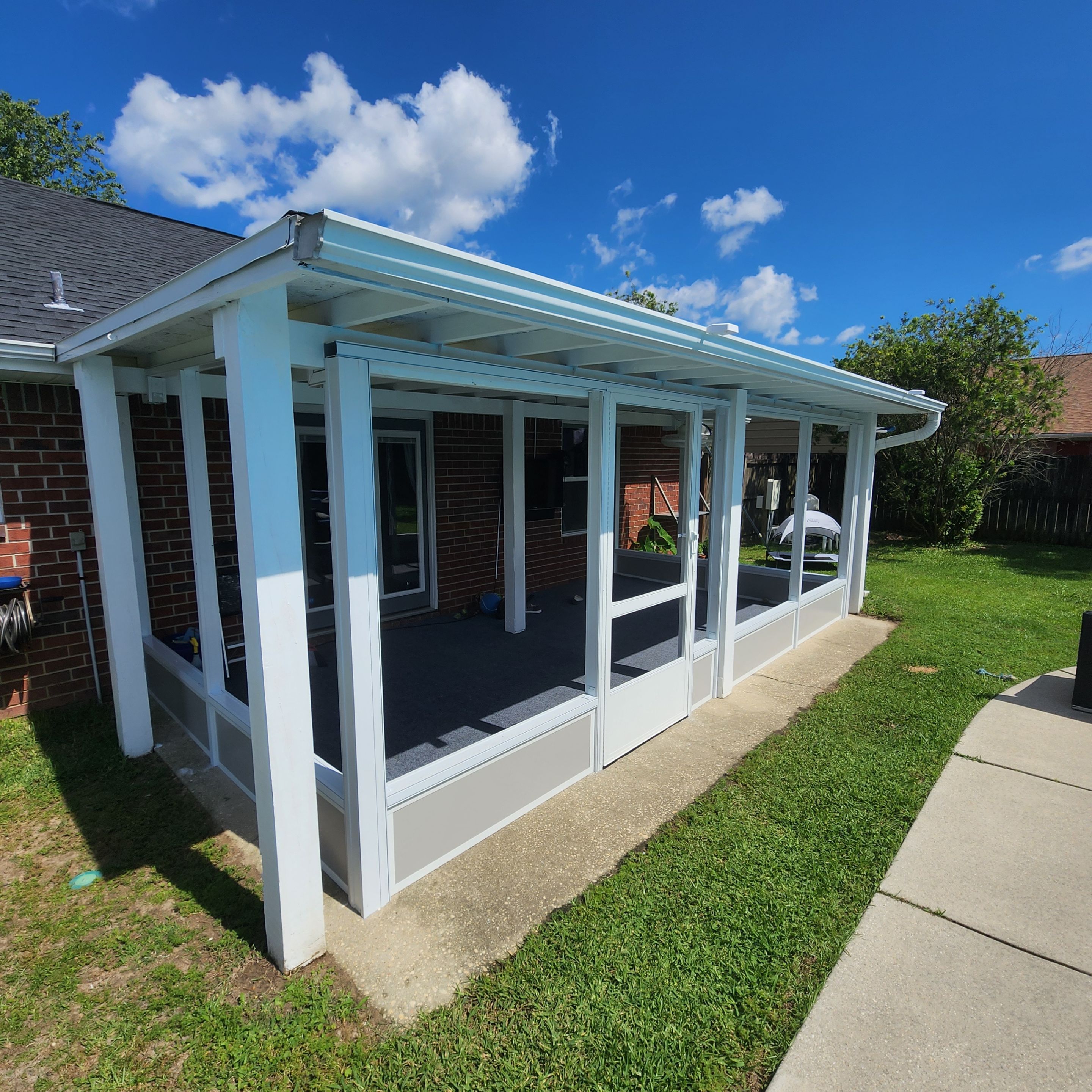 Screen Room Built Under Existing Roof by Titan Sunrooms