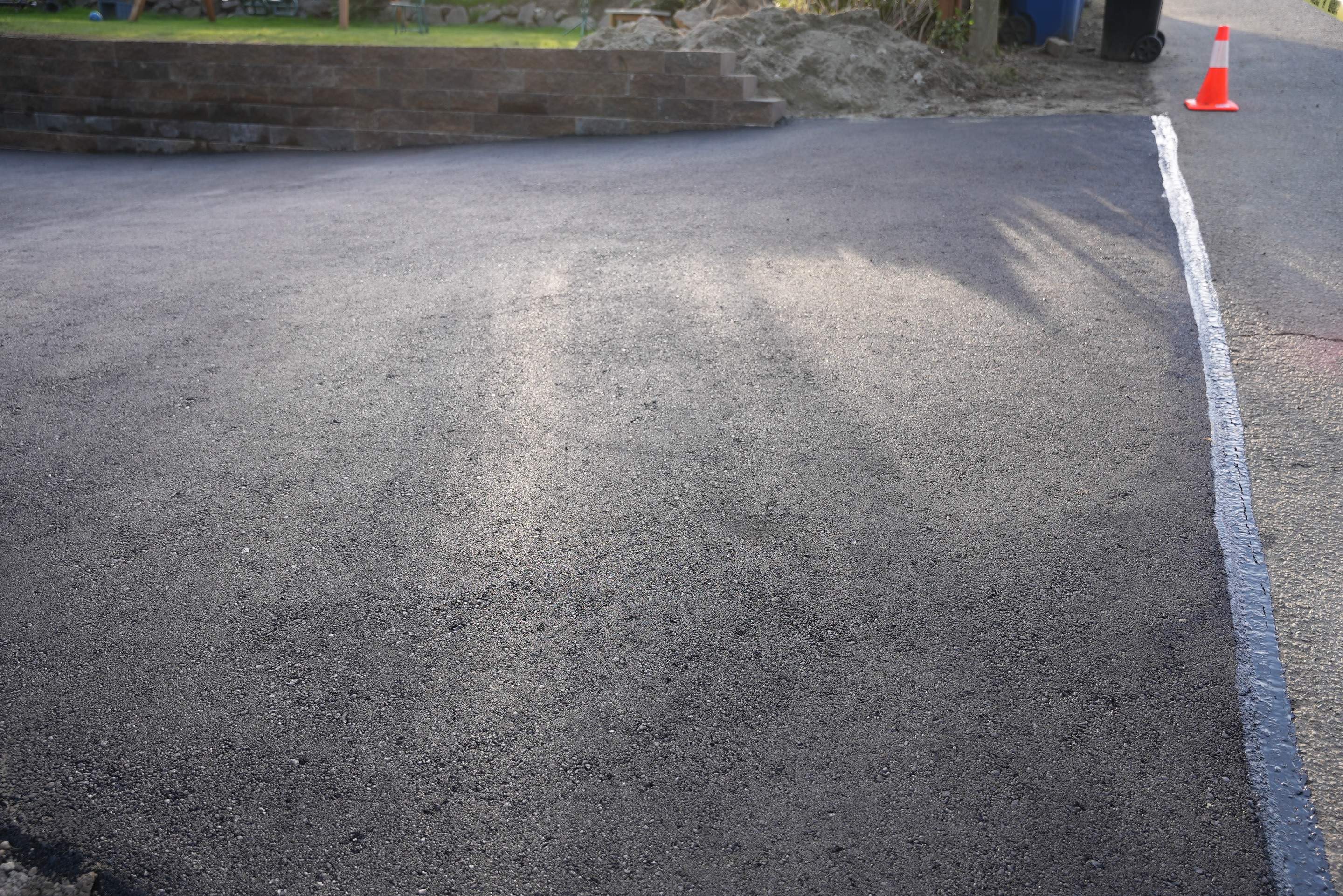 Lorra | Asphalt Driveway Repair & Retaining Wall by Jireh Asphalt & Concrete Inc 