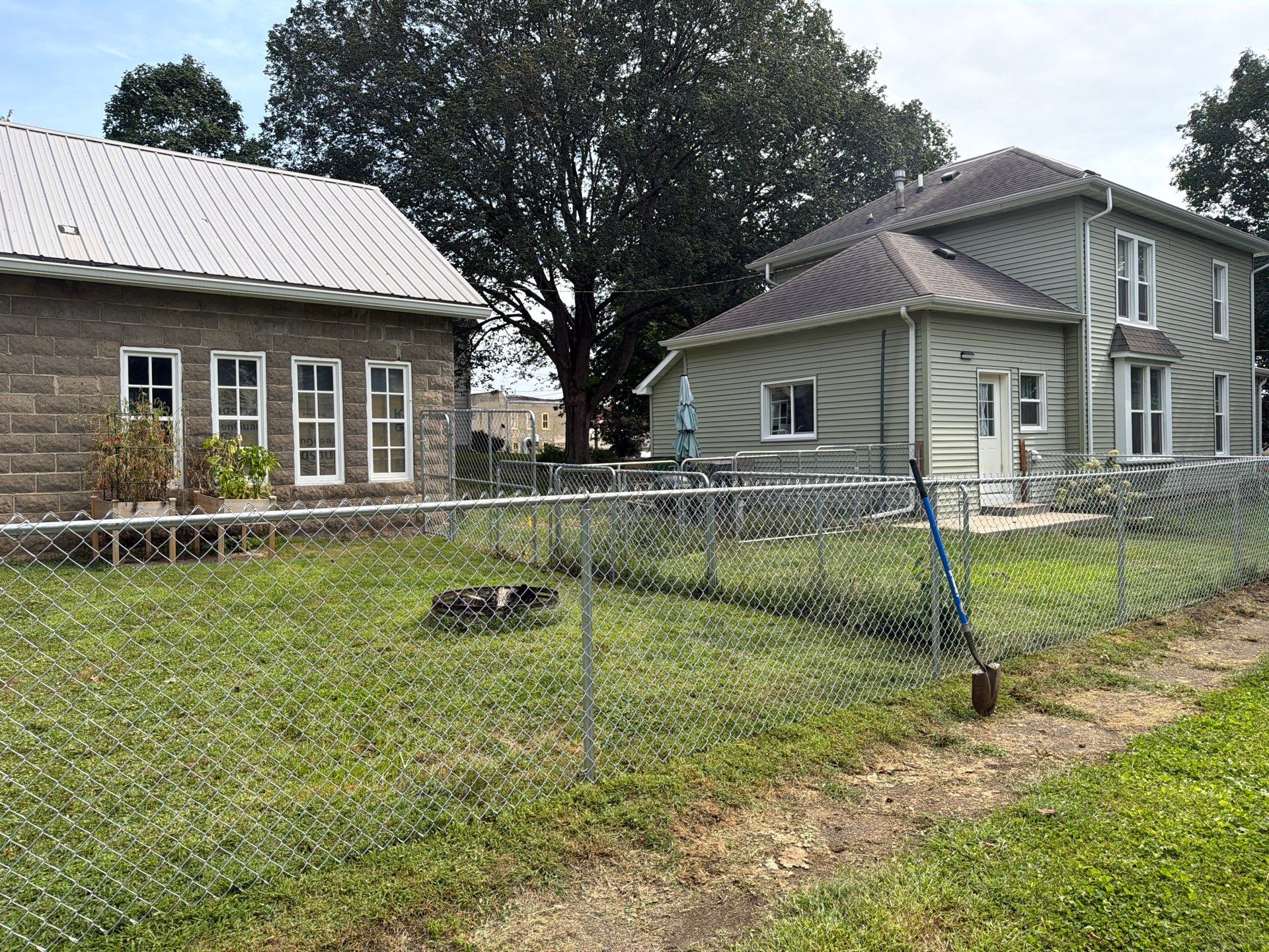 Galvanized Chain Link Fence and Gate Installation in La Porte City by Perfect Picket Fence and Stain