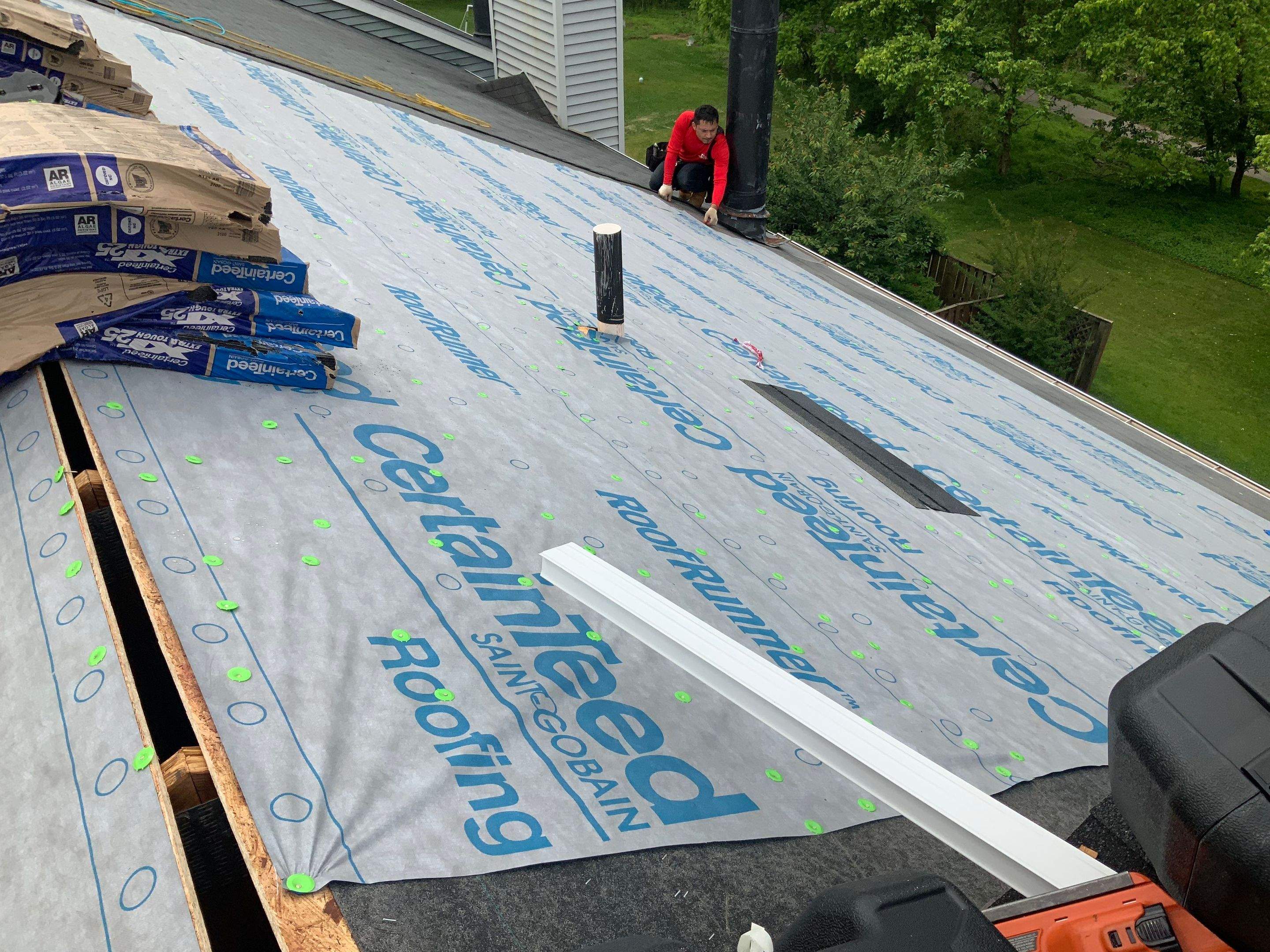 Residential Roofing Installation using XT-25 Color Moire Black by Alpha Design Services