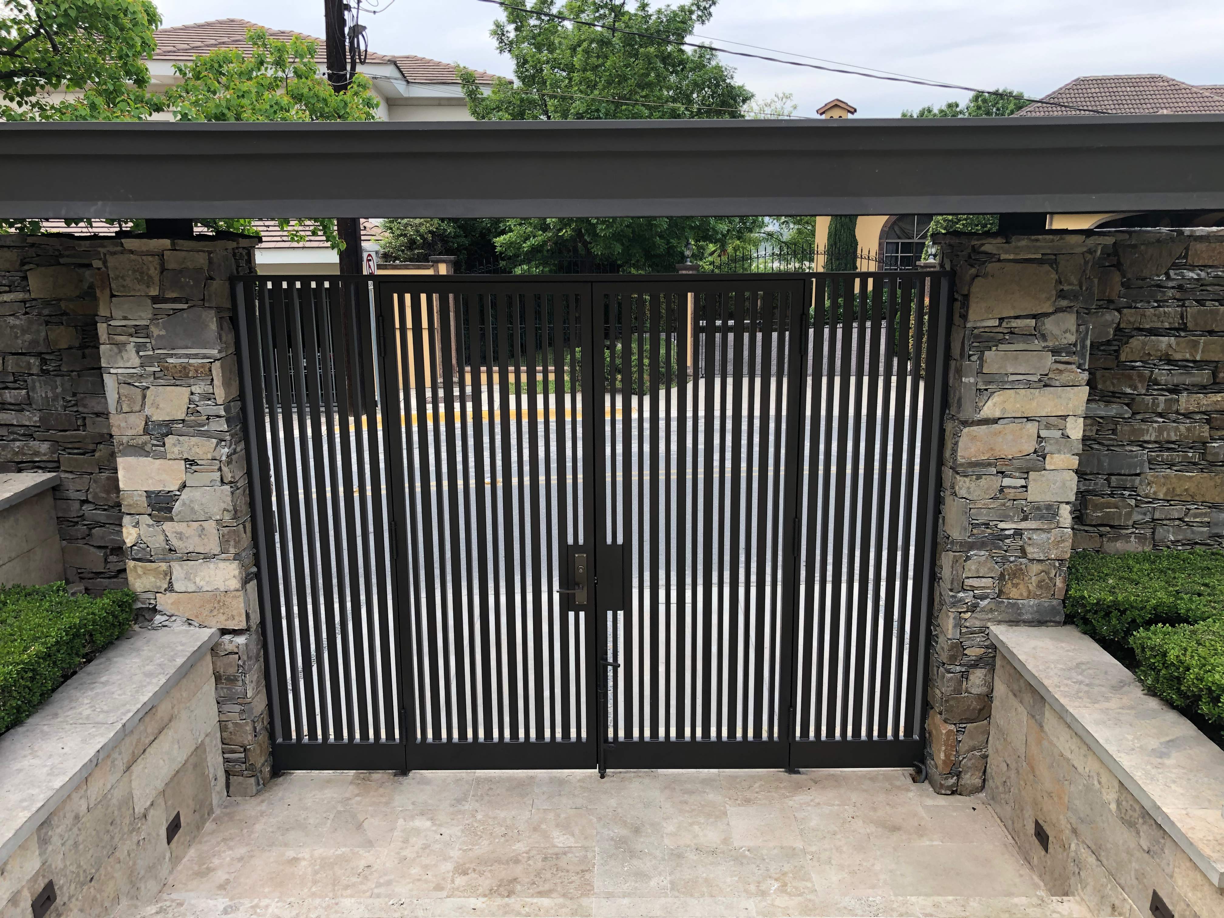 Custom Stone Entryway and Secure Perimeter Gate Installation in Monterrey by Solara Custom Living