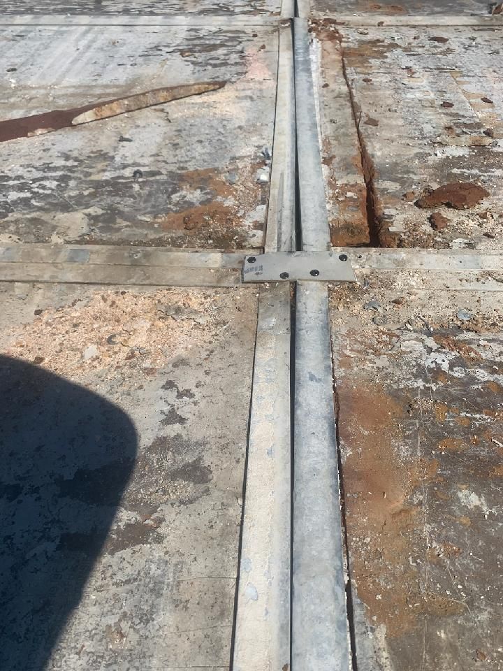 Commercial Roofing Installation using Aluminum Roofing panels by Hostetler Roofing