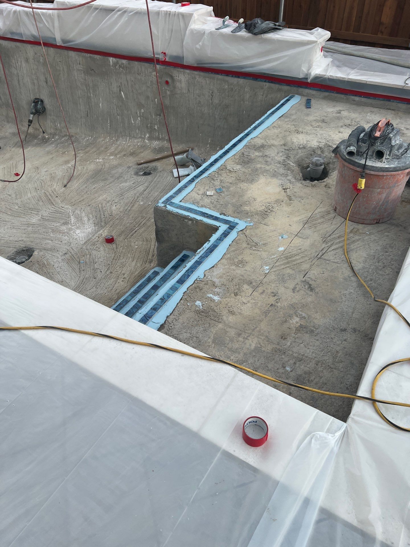 Geometric Pool with Tanning Ledge by Pinnacle Pools and Spas - DFW