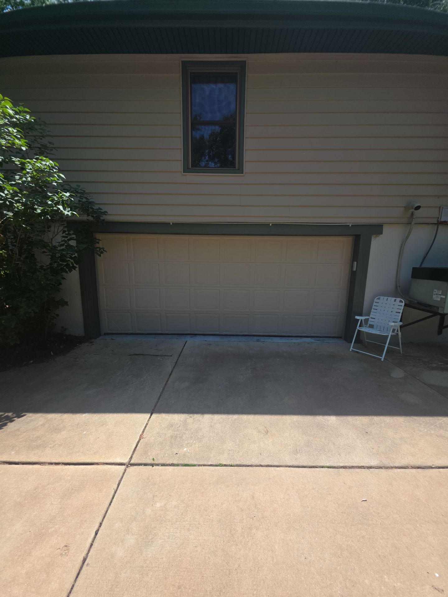 Exterior Entry Door and Garage Door Painting by Legendary Services Company LLC.