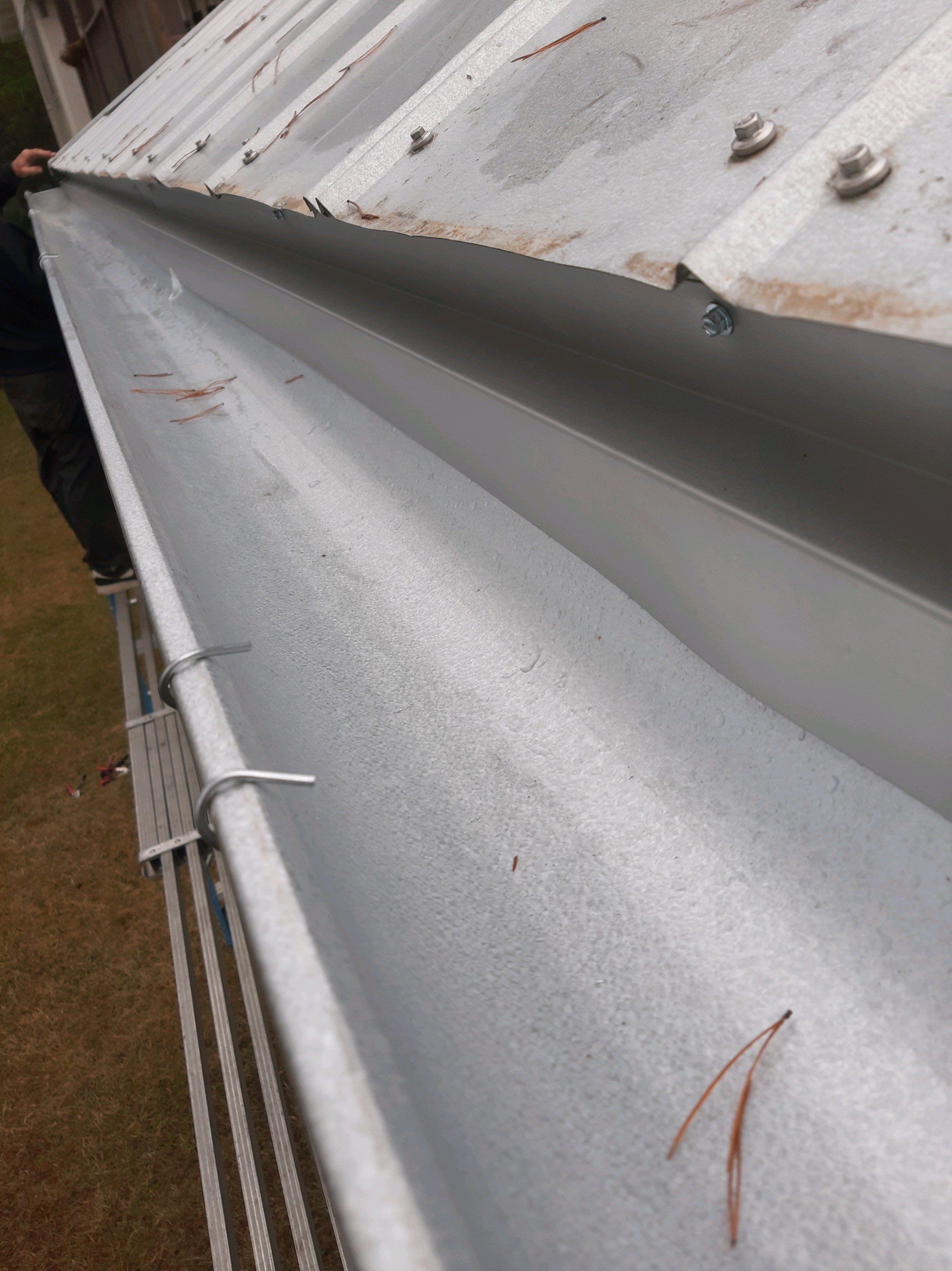 Gutter Installation using Galvalume Half Round Seamless Gutters by Gutter Professors