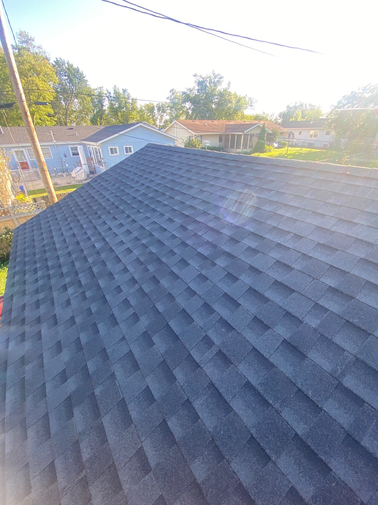 Asphalt Roof Replacement by Custom Installations