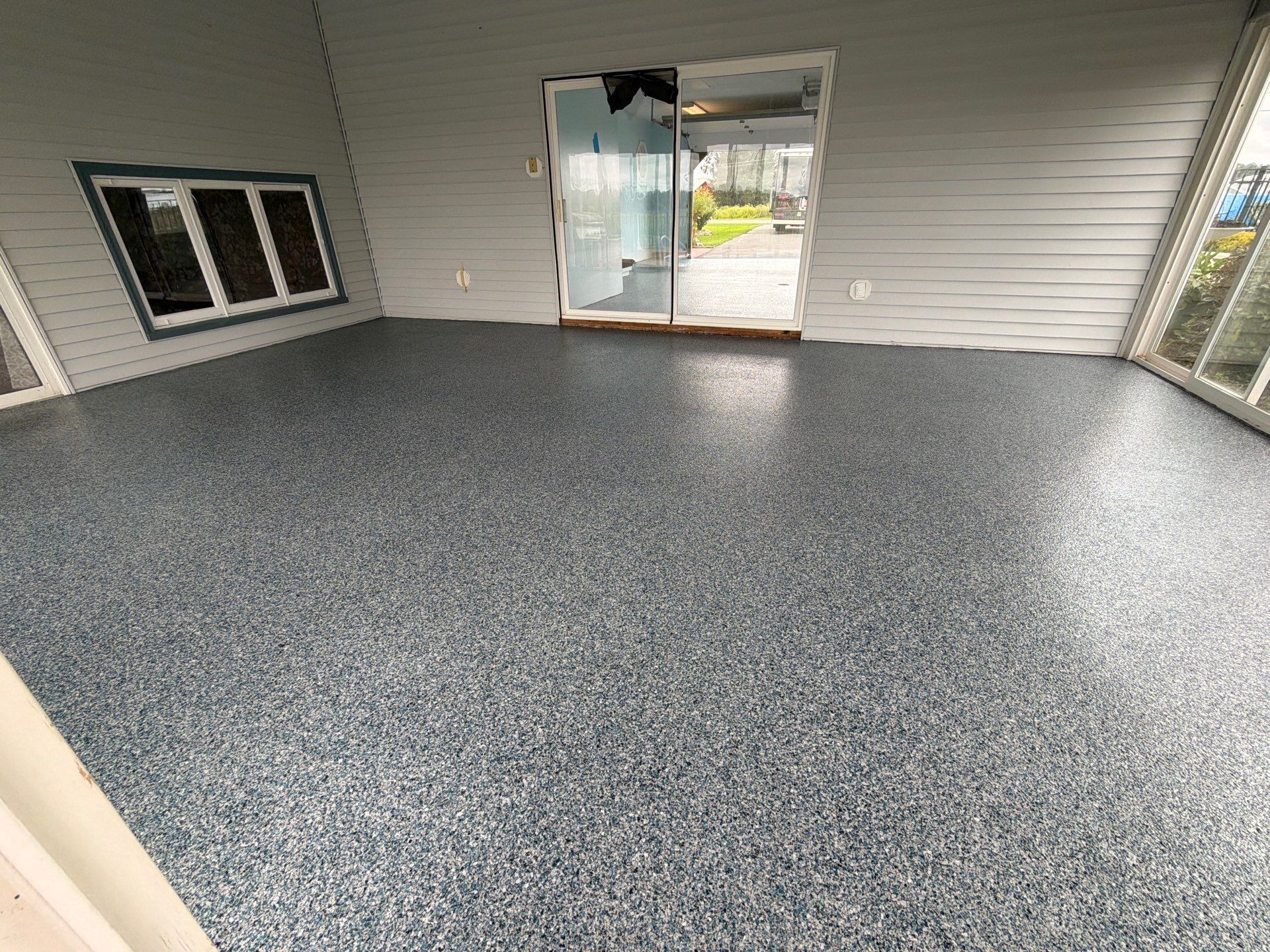 Vintage Cobalt Garage Coating by NG Masonry & Construction LLC