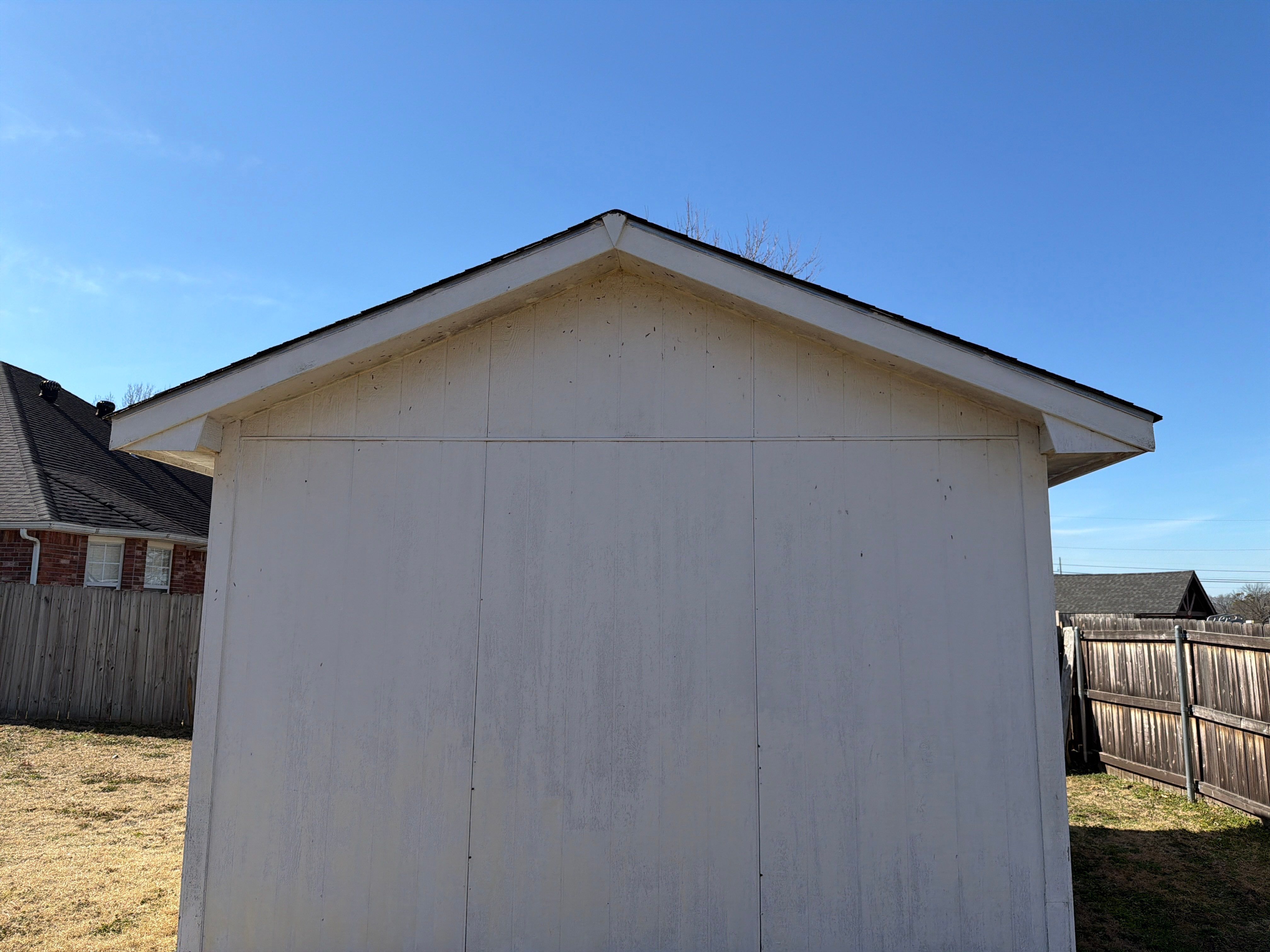 Black roof & gutters!! by In & Out Construction & Remodeling, LLC