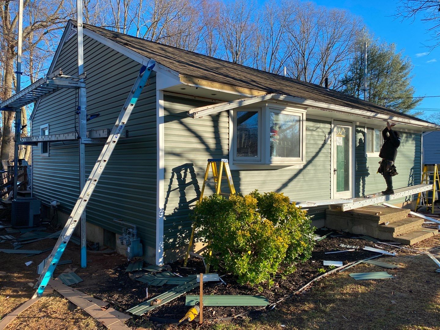 Siding Installation using Certainteed Mainstreet Forest Green by A Plus Exterior