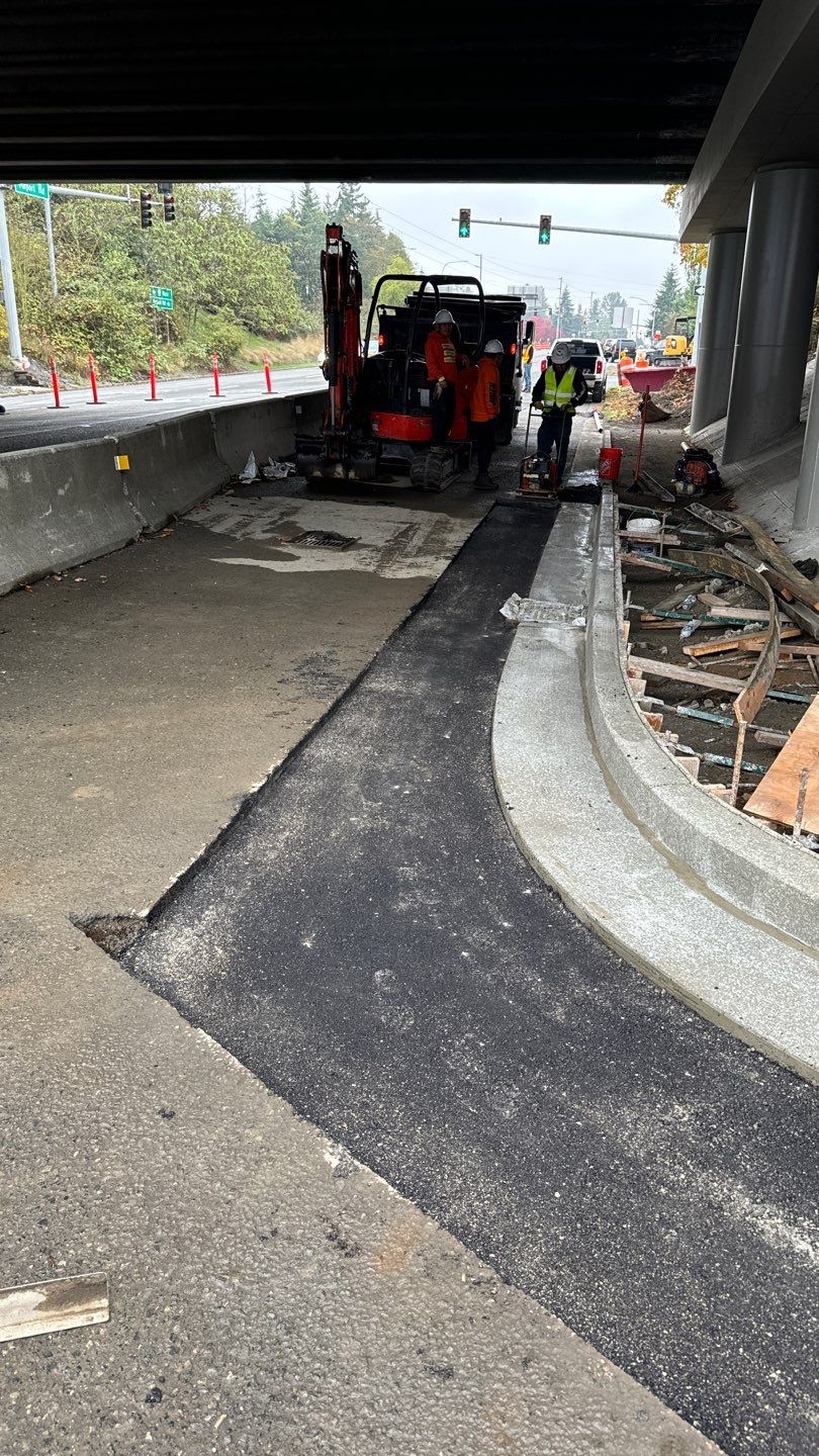 Kraemer North America | Airport Road Repair by Jireh Asphalt & Concrete Inc 