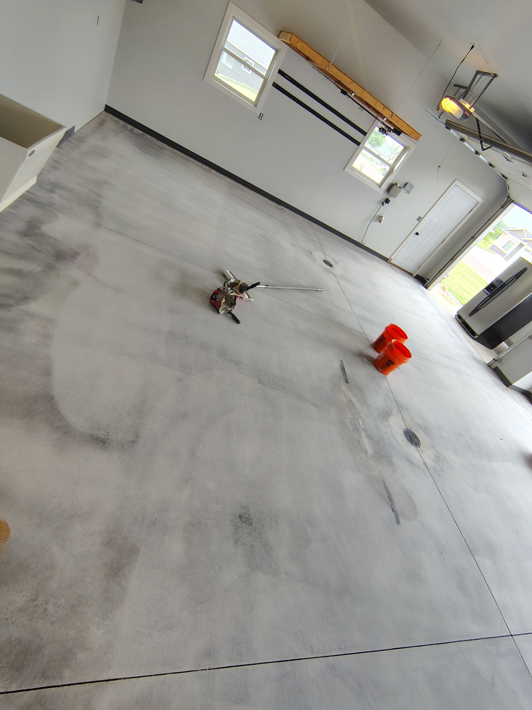 Multi-Car Garage Concrete Coating and Crack Repair in Dell Rapids by Select Painting, Coatings & Garage Cabinets