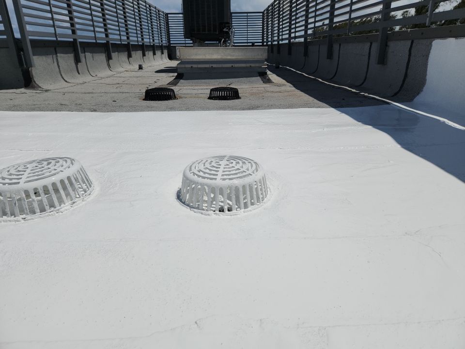Flat Roof Silicone Coating and Drain Repair in Ocean Ridge by Aastro Roofing