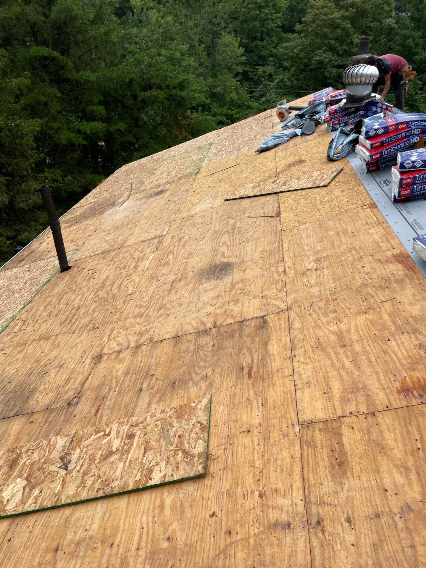 Residential Roofing Installation using GAF Timberline HDZ Charcoal by Rainstoppers Roofing