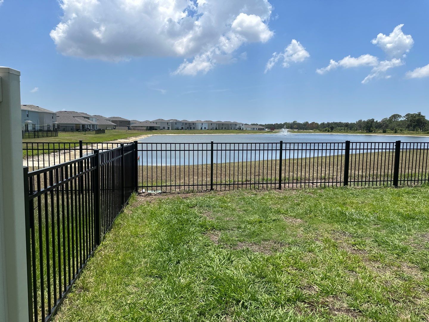 Aluminum Fence Installation using Black 3 Rail Aluminum Fence and Tan Vinyl Privacy Fence by Asap fence and gates, LLC
