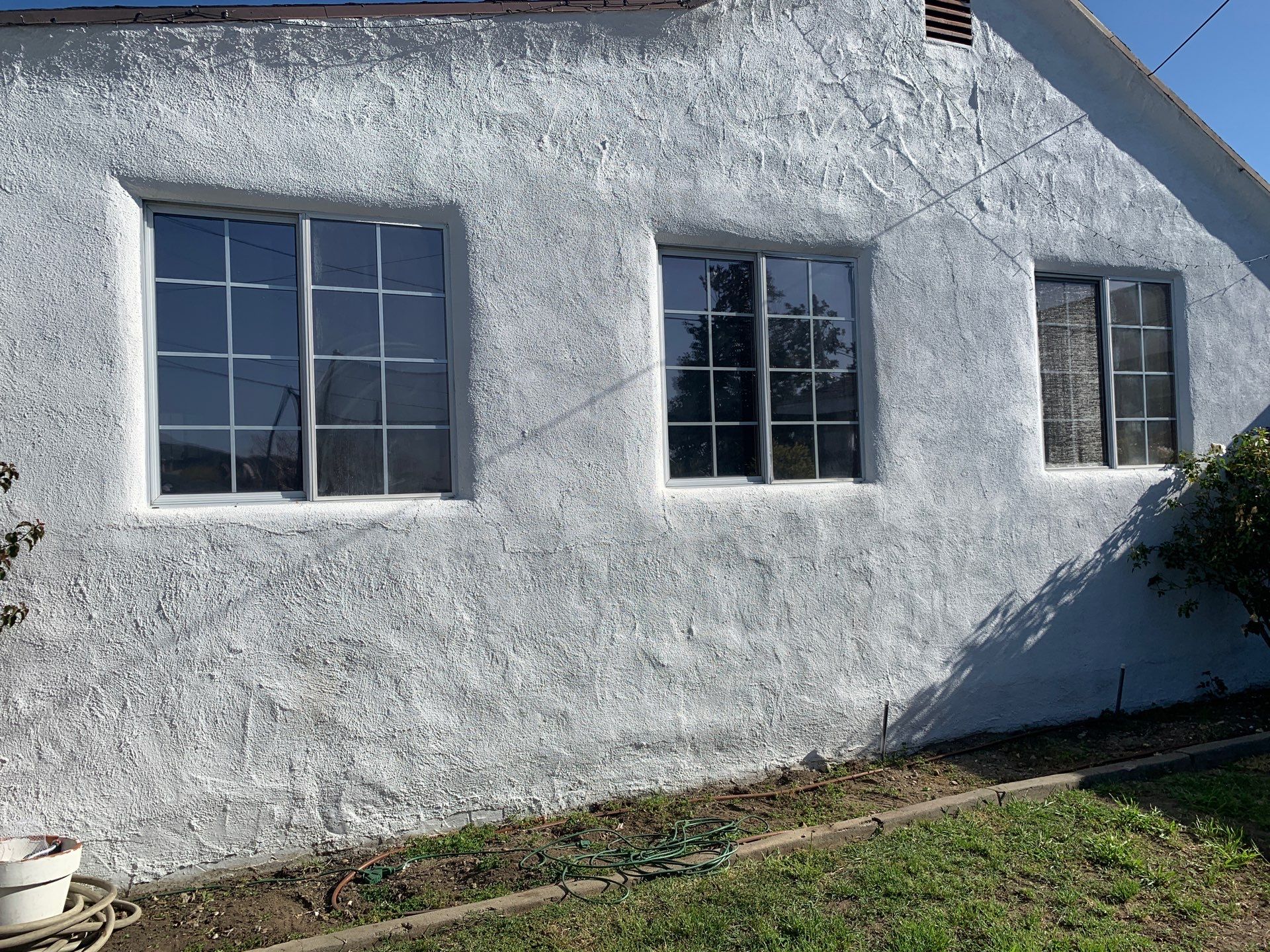 Window Installation using Black Anlin windows by American Window Company