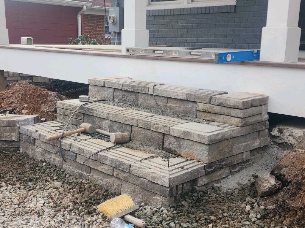 Retaining wall, walkway, small patio and landscape install by The Smet Companies, LLC