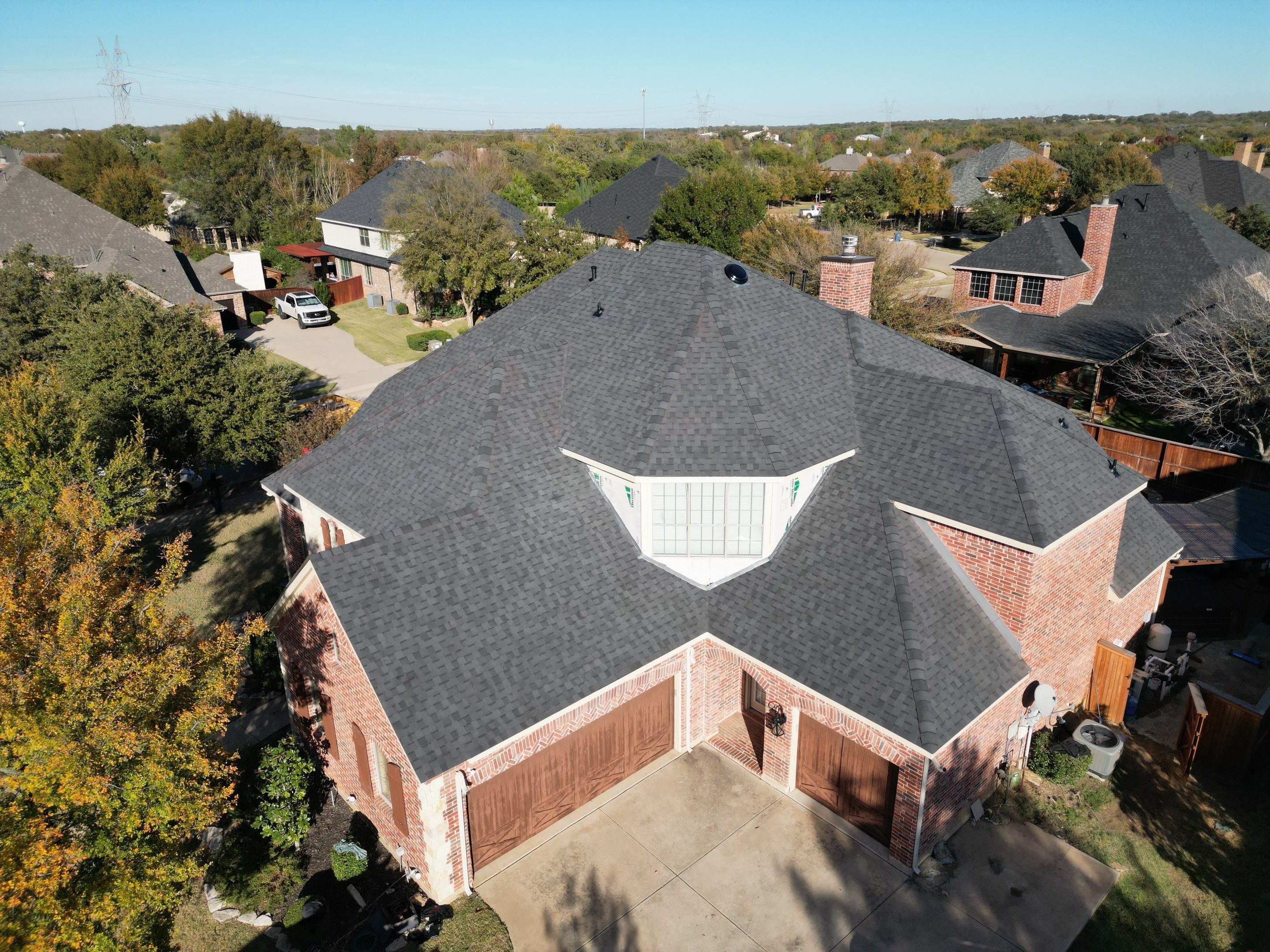 Certainteed Moire Black by First Out Roofing 