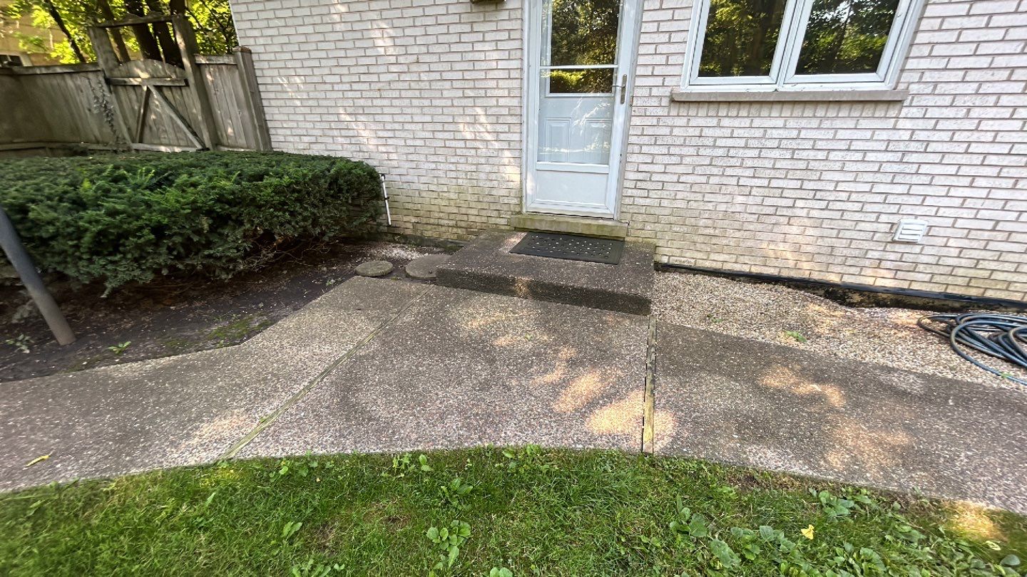 Aggregate concrete cleaning and sealing using Surebond SB-9000 by Northern Power Washing LLC.