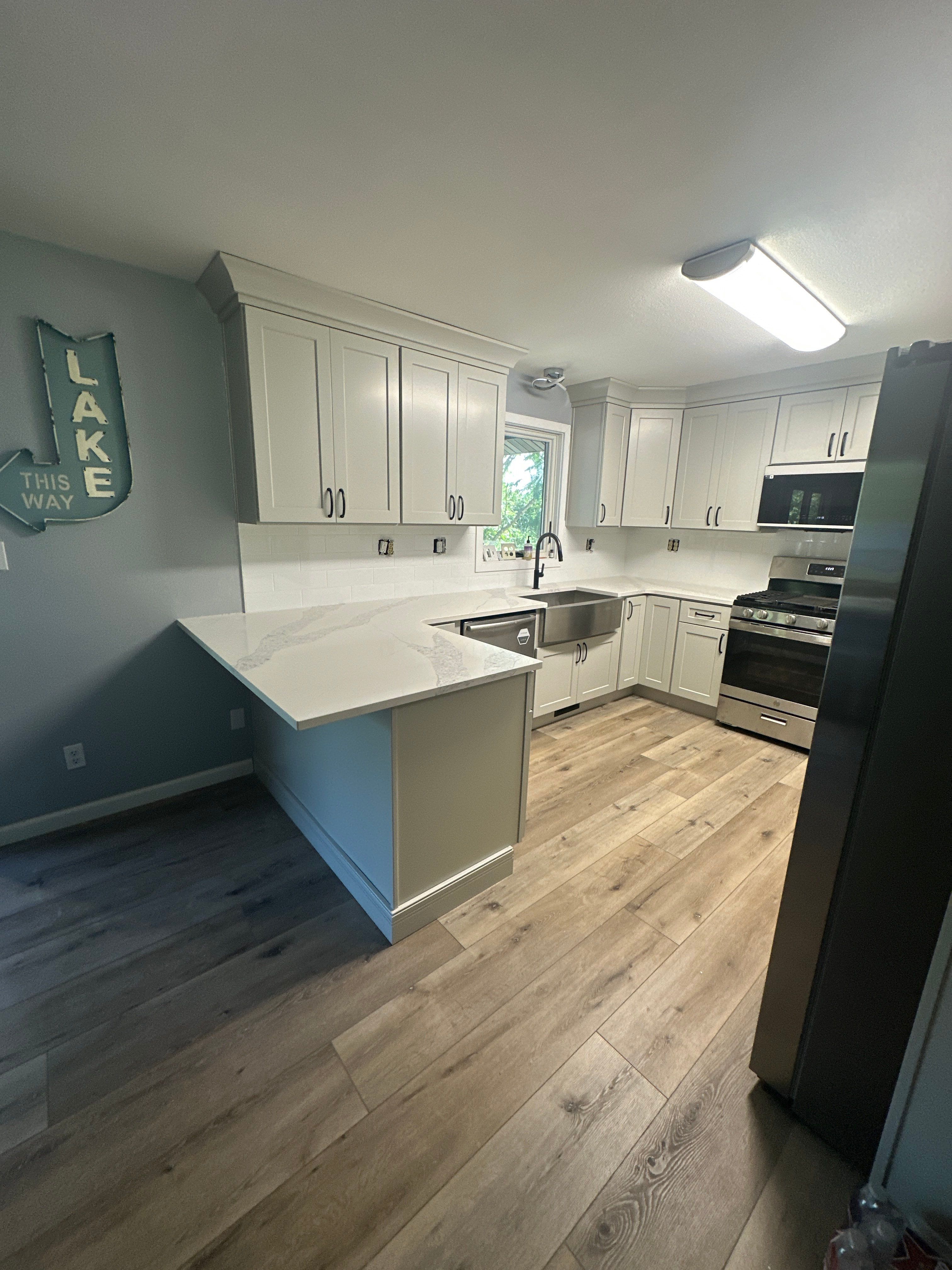 Lampe Lake Home off Uniqueville by Kitchen Works LLC