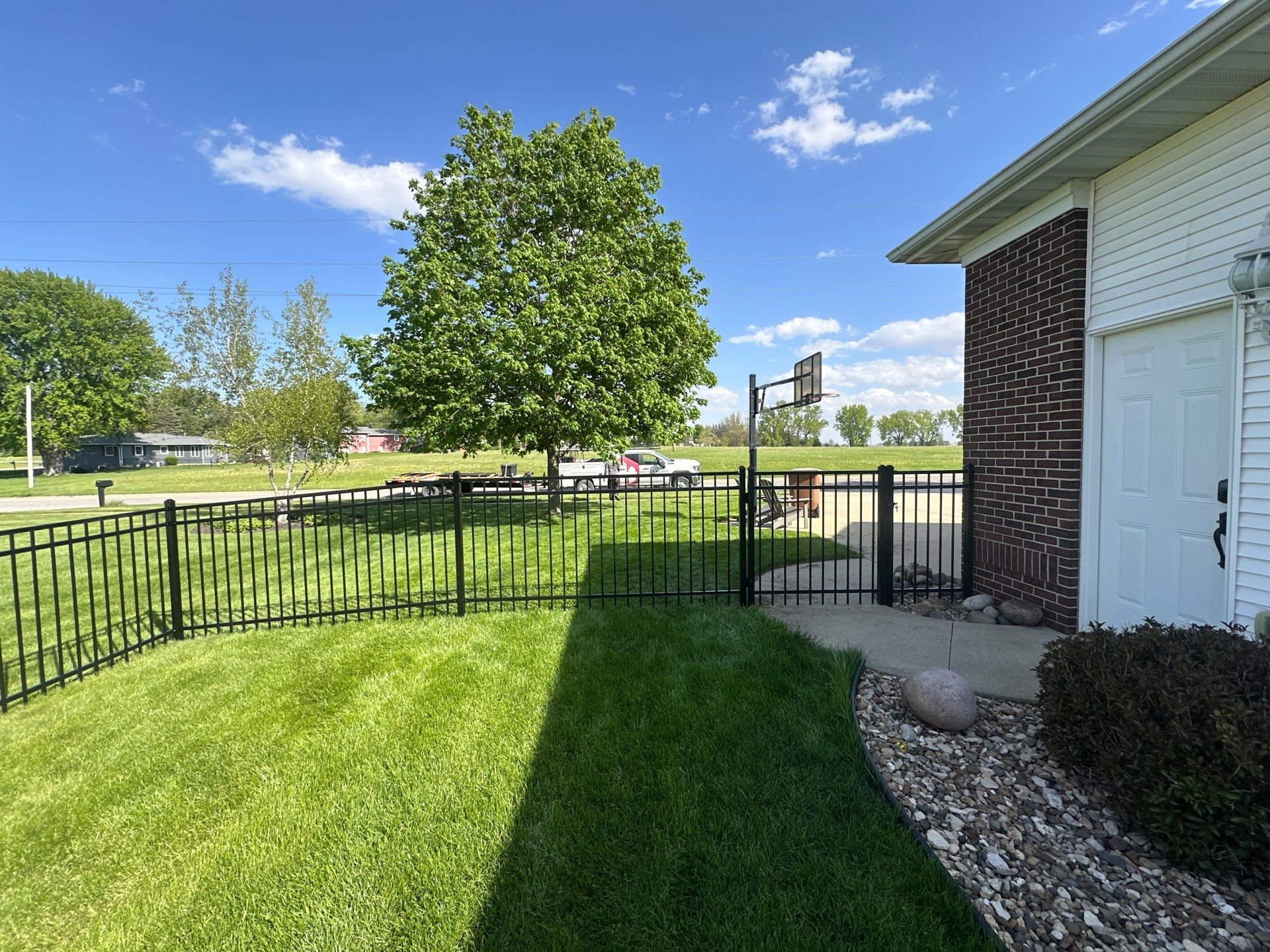 Black Ornamental Metal Picket Fence Installation in Waterloo by Perfect Picket Fence and Stain