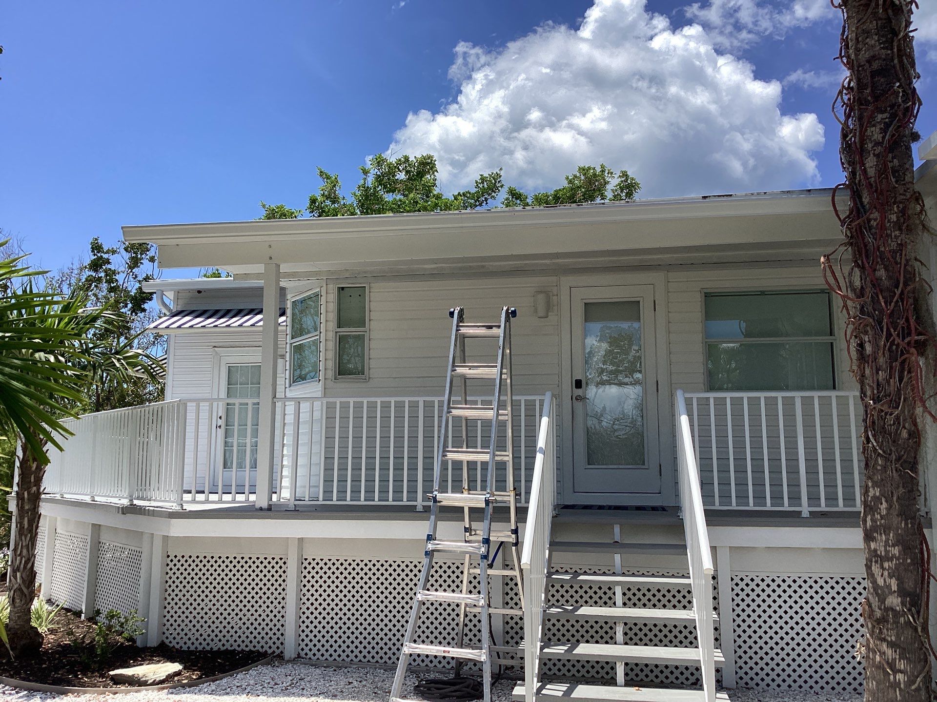 Downspout Installation using Charcoal Grey in Sanibel FL by Gutter Professors