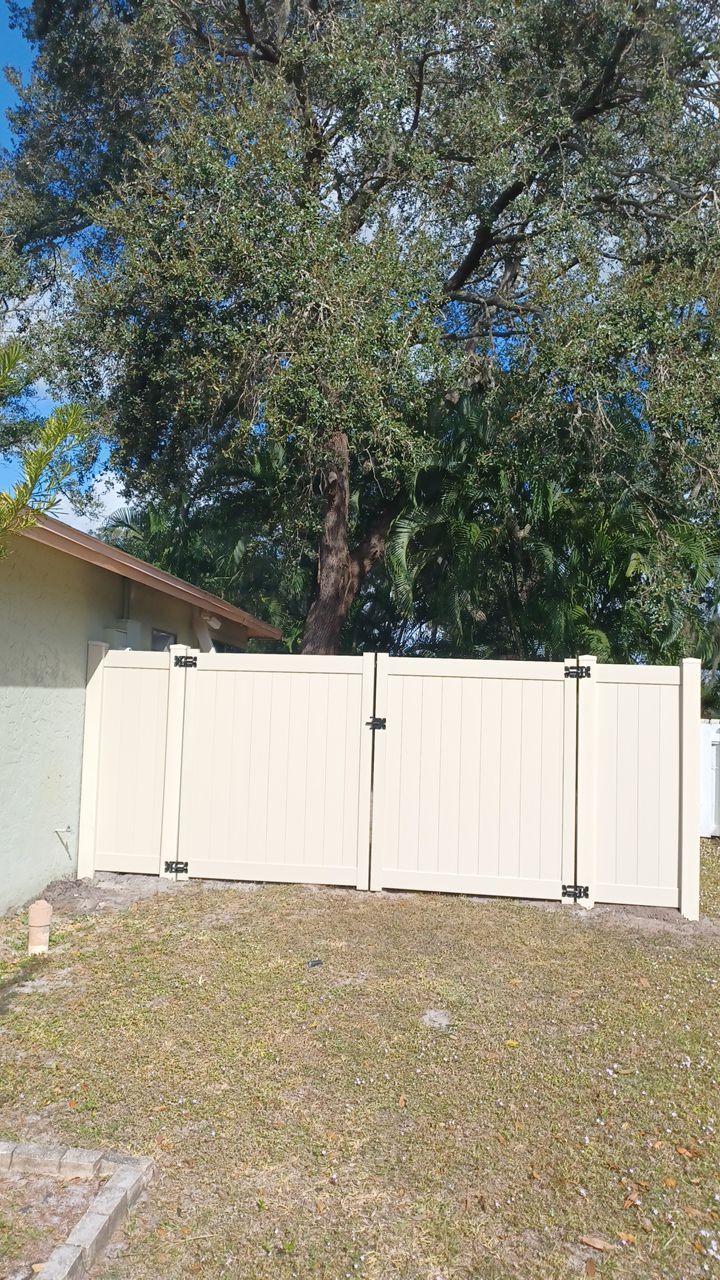 Sarasota, FL 6ft. Tall Tan Vinyl Privacy Fence  by Asap fence and gates, LLC