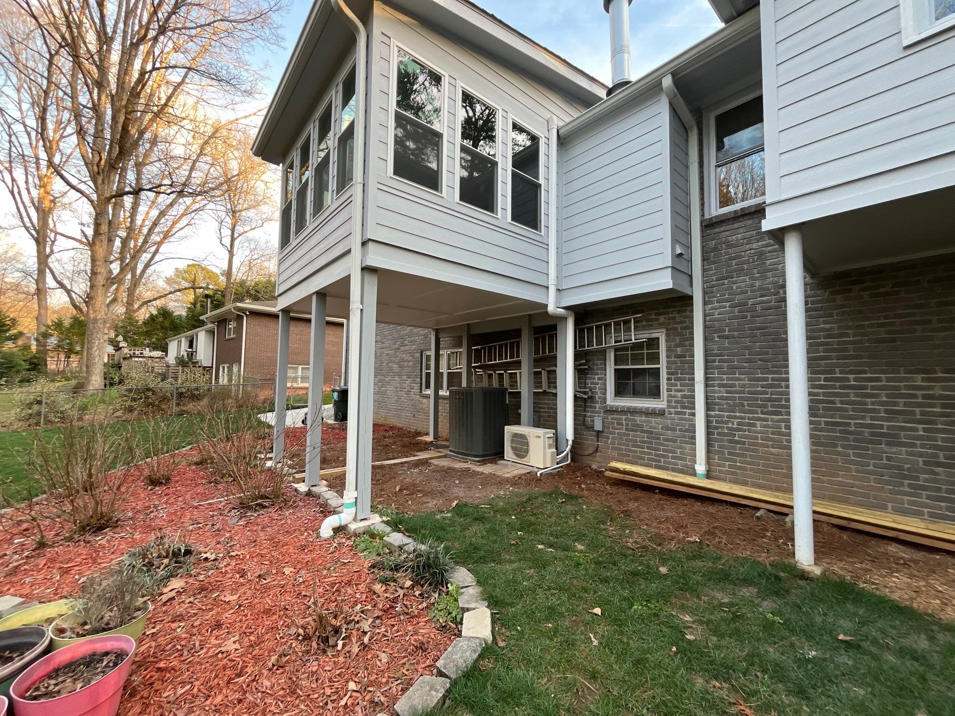 James Hardie Siding Replacement, Trex Railing Install, Exterior Painting, and Staining in Stone Mountain, GA by Nelson Exteriors 