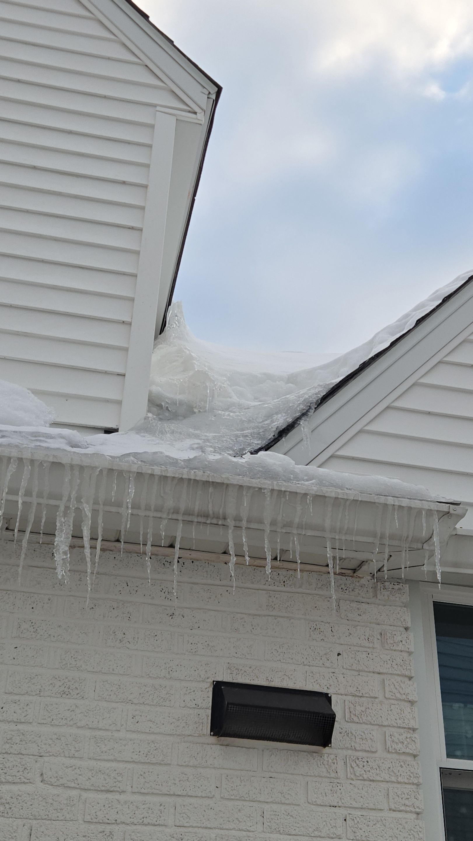 Massive Ice Dam Removal by Level Up Roofing and Restoration Services LLC